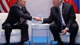 U.S. President Donald Trump shakes hands with Russia's President Vladimir Putin during their bilateral meeting at the G20 summit in Hamburg, Germany July 7, 2017. REUTERS/Carlos Barria - RC14D22F5350