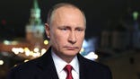 In this photo released by the Kremlin Press service via Sputnik agency, Saturday, Dec. 31, 2016, Russian President Vladimir Putin speaks during an undated recording of his annual televised New Year's message in the Kremlin in Moscow, Russia, . President Vladimir Putin invoked a bit of seasonal enchantment in his New Year's Eve remarks to the nation. The recorded message was being televised just before midnight Saturday in each of Russia's nine time zones. (Mikhail Klimentyev/Kremlin Press Service, Sputnik, via AP)