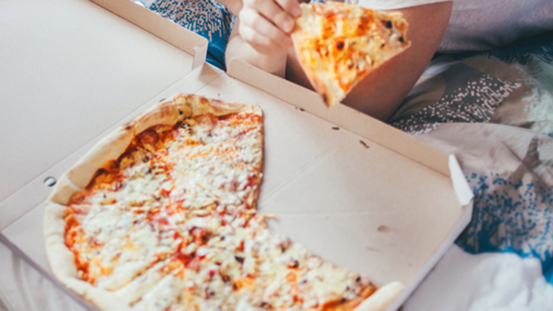 Domino's delivers pizza to man in bed with 'sinister' hangover | Fox News