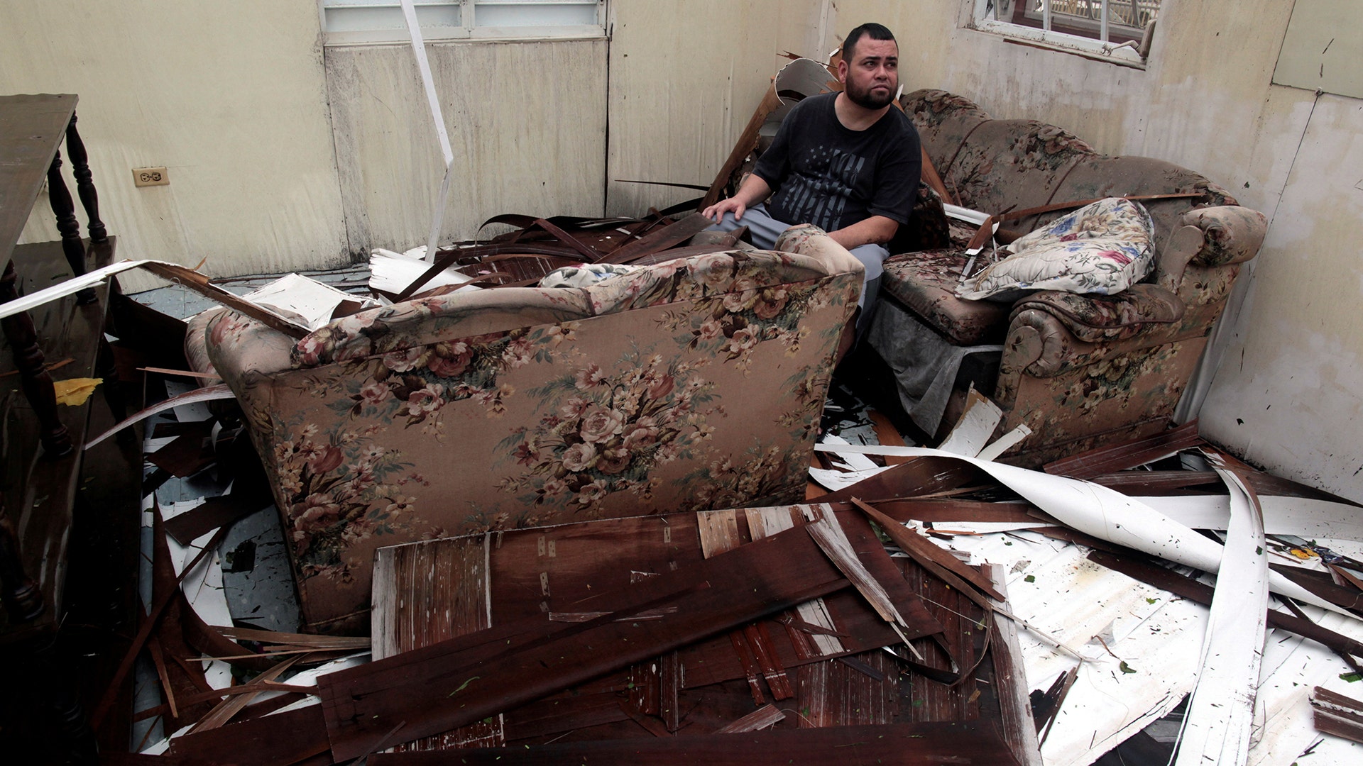 Juan Carlos Melendez in his damaged home hit by Hurricane Maria in Catano, southwest of San Juan, Puerto Rico September 21, 2017