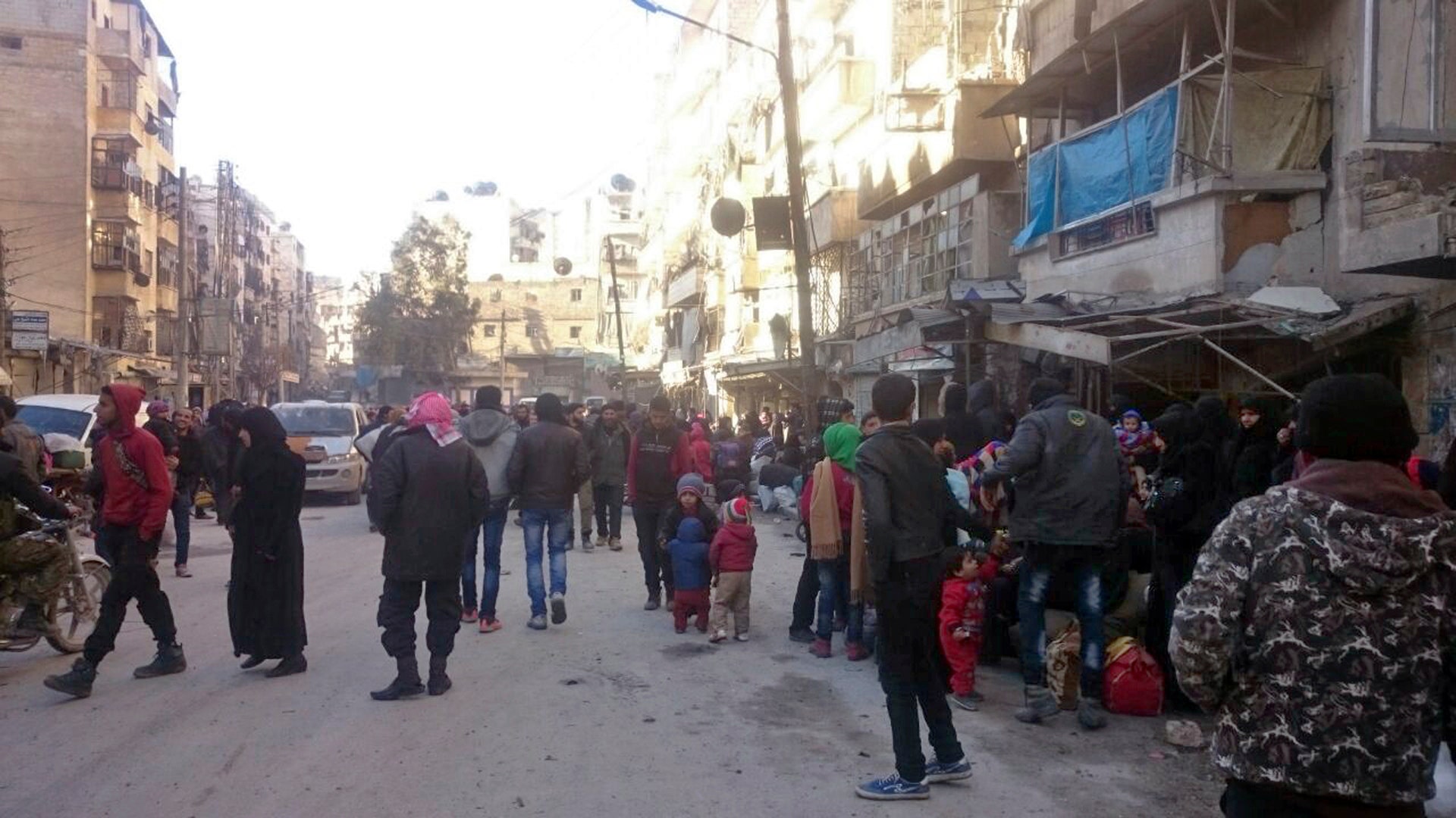  Residents in eastern Aleppo are starting to board buses and ambulances as the long-awaited pullout from the last rebel enclave in the embattled city gets under way. 