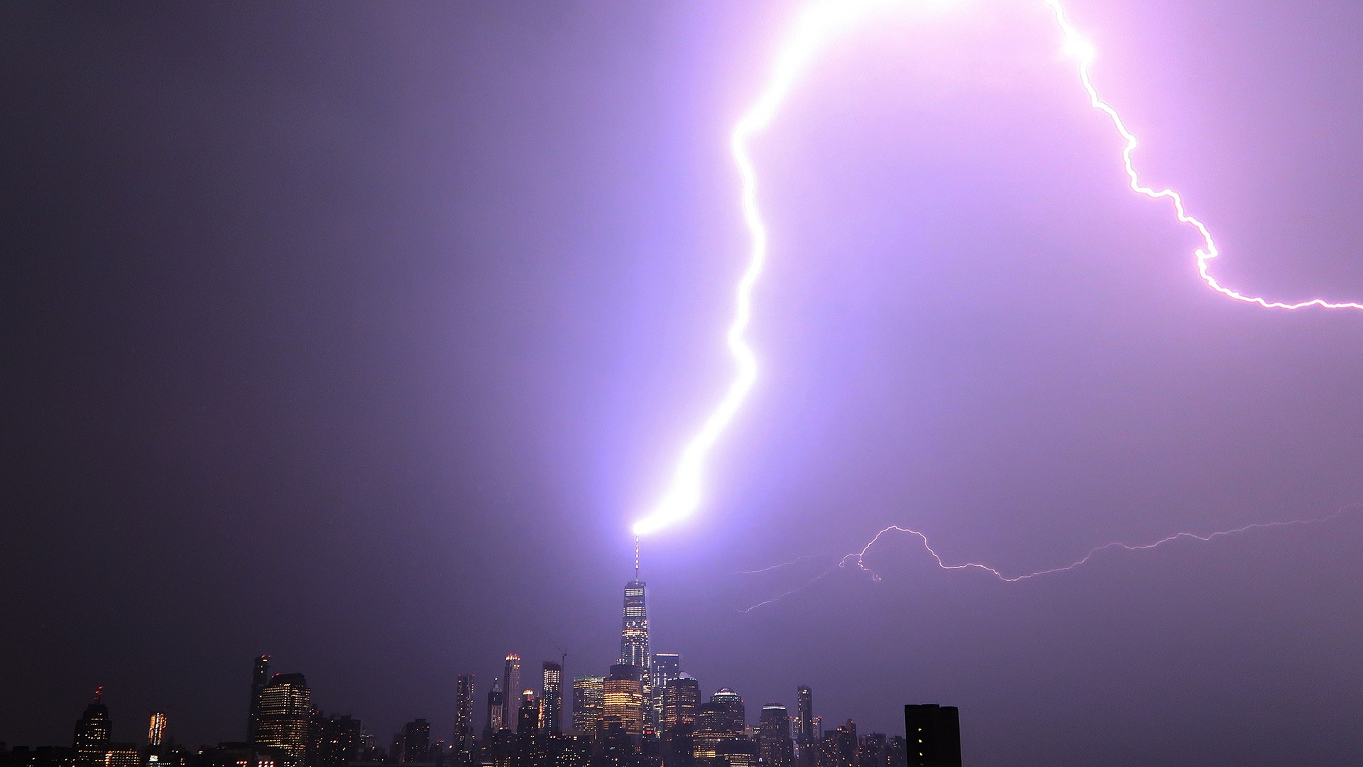A bolt of lightning strikes One World Trade Center in New York City, August 22