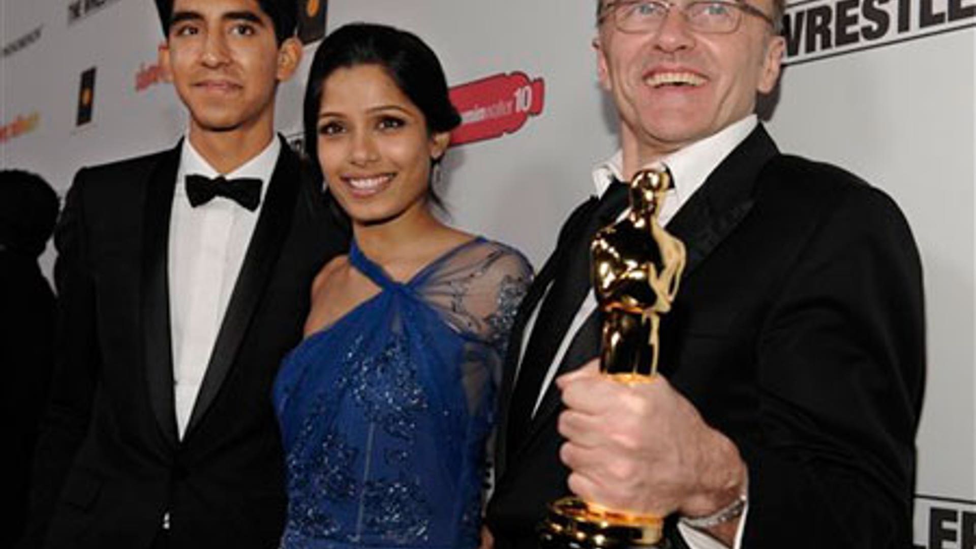 Danny Boyle, Dev Patel, and Freida Pinto