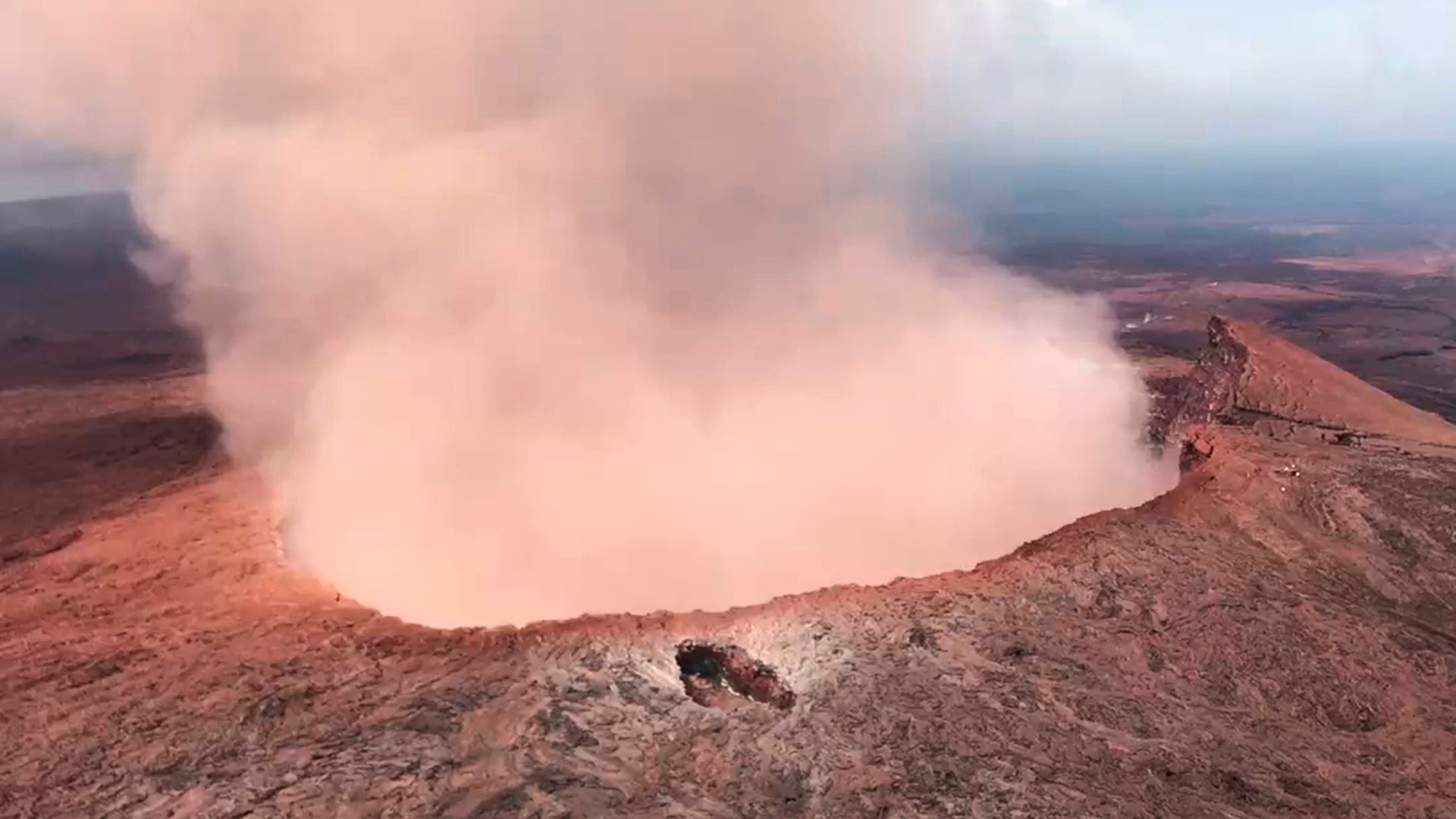Ash from the Puu Oo vent on Kilauea volcano rises into the air, near Pahoa, Hawaii, May 5, 2018