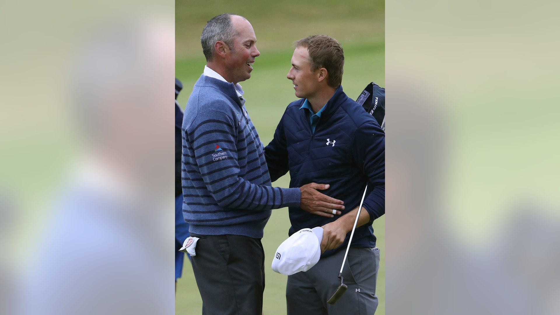 Jordan Spieth is congratulated by Matt Kuchar after winning the British Open Golf Championship at Royal Birkdale, Sunday