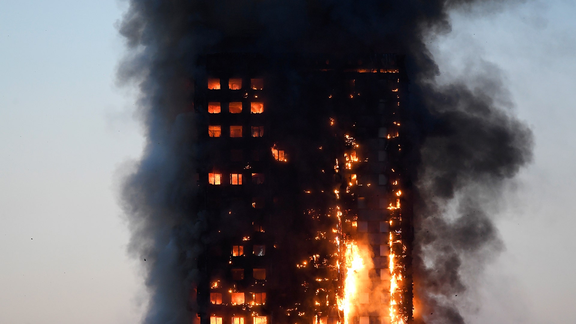 Flames engulf the apartment building in West London