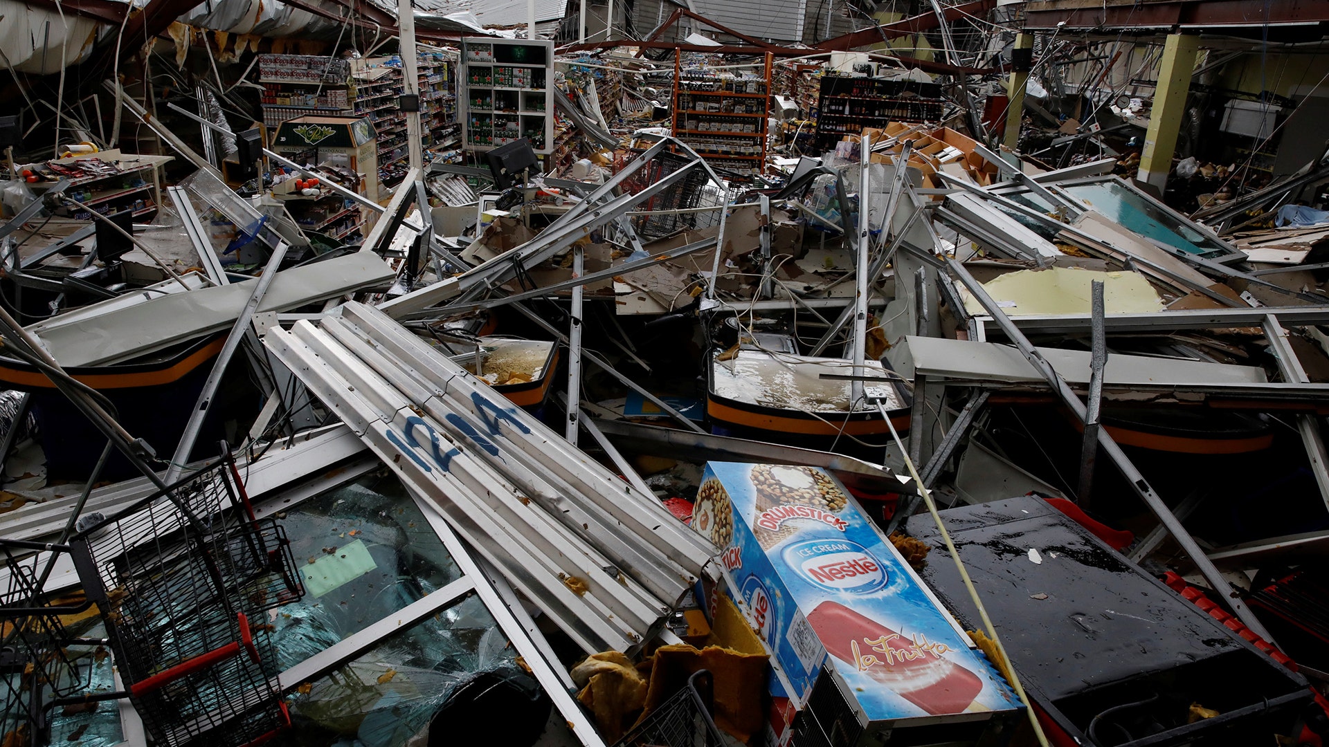 Damages are seen in a supermarket after the area was hit by Hurricane Maria in Guayama, Puerto Rico, Wednesday