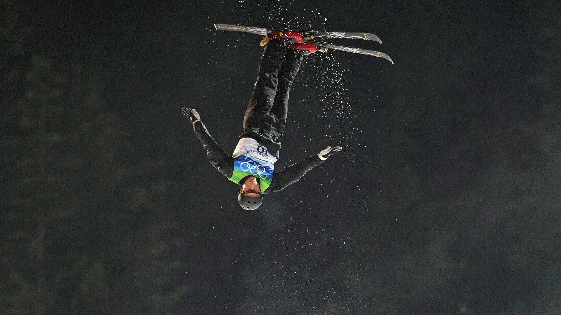 Gold medalist Alexei Grishin (Belarus) competes in the men's aerials freestyle skiing final at the 2010 Vancouver Winter Olympics