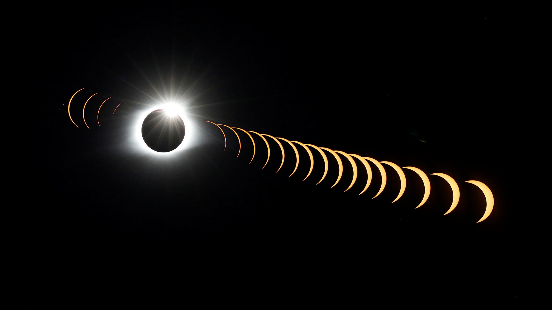 A multiple exposure image shows the solar eclipse from Clingmans Dome  in the Great Smoky Mountains National Park, Tennessee