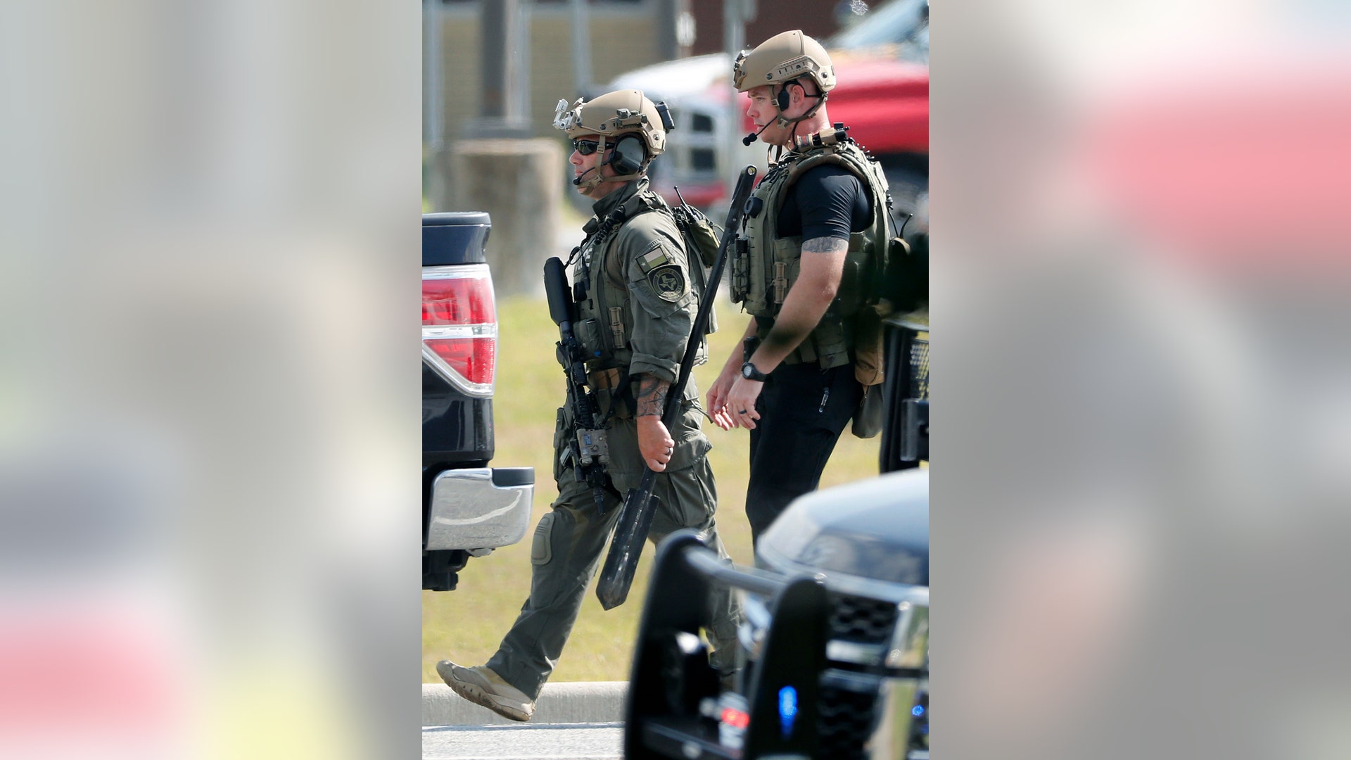 Police officers at the Santa Fe High School after a shooting in Santa Fe, Texas, May 18, 2018