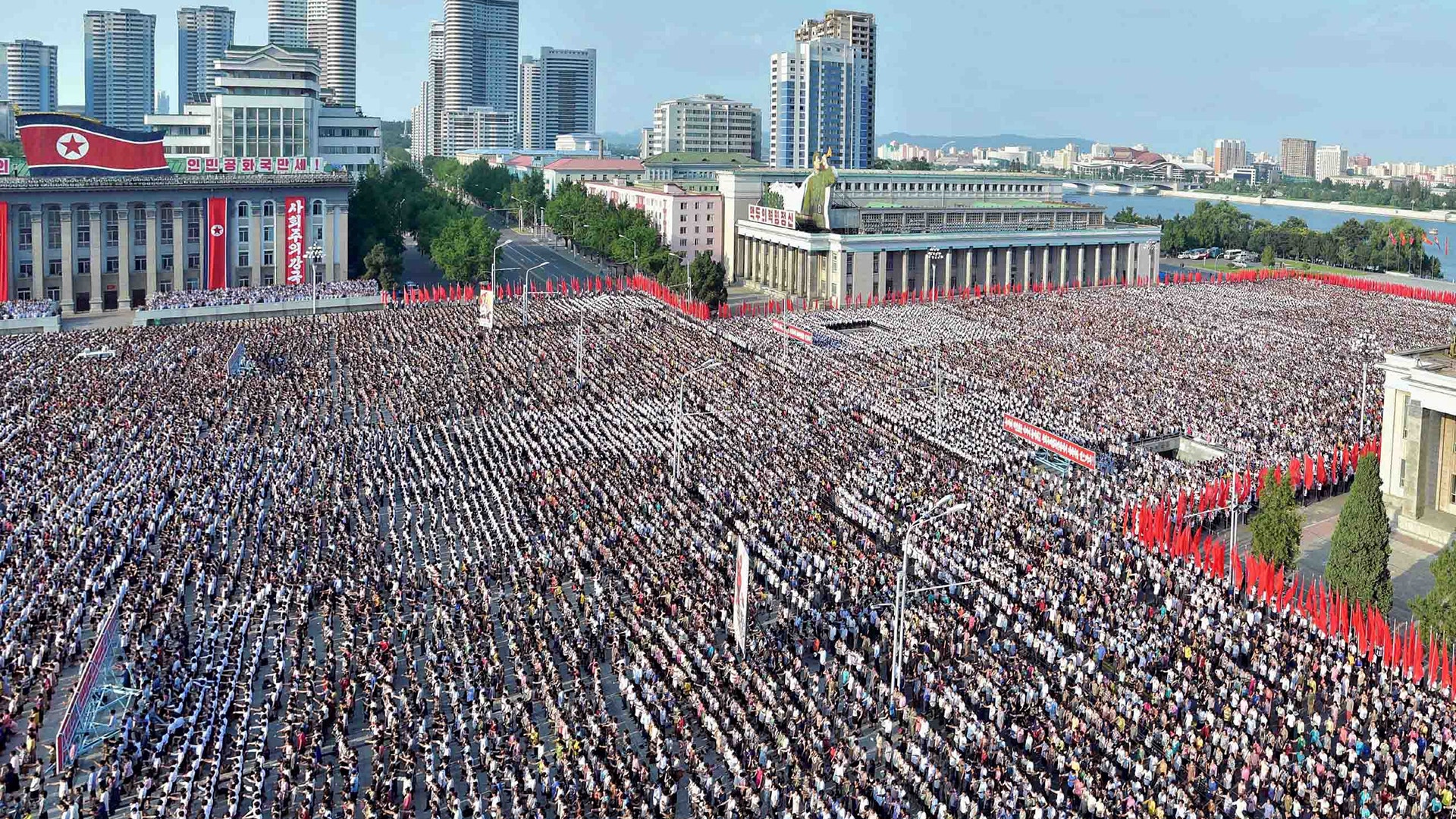 North Koreans rallying in Kim Il Sung Square in Pyongyang, August 9
