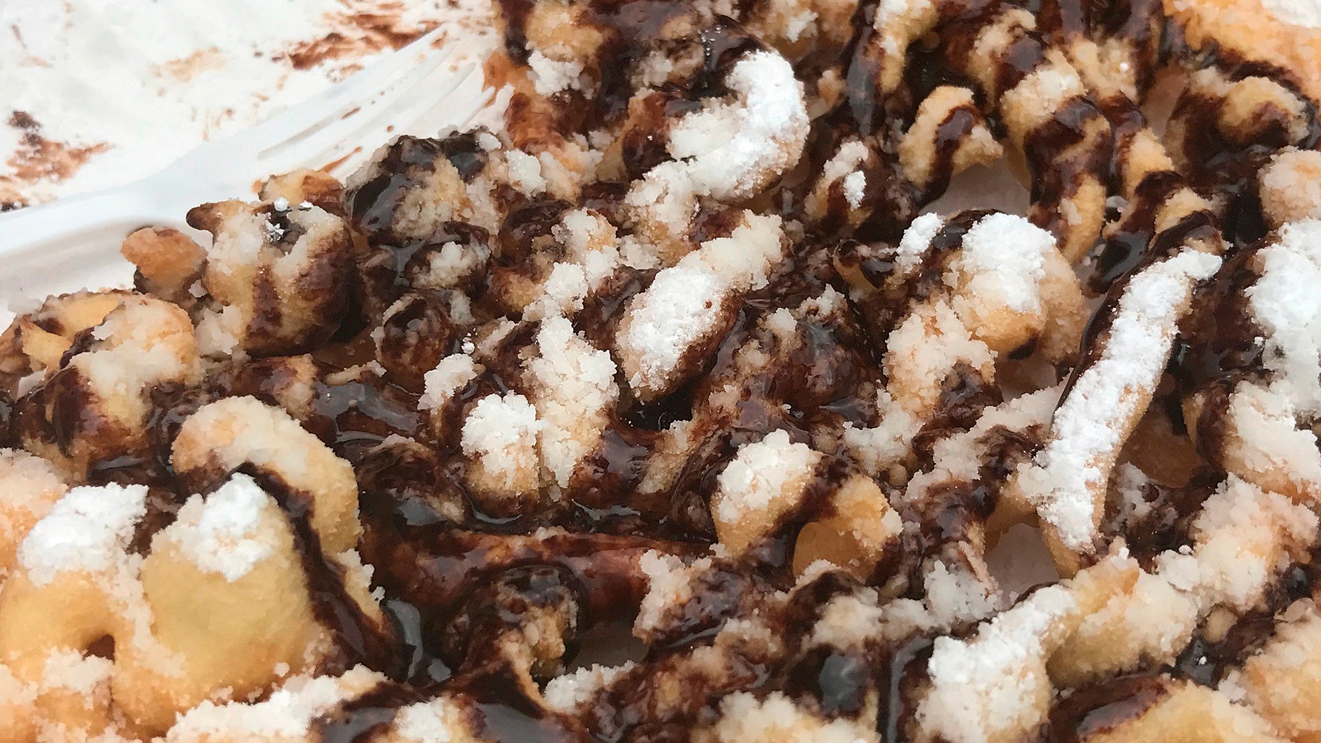 The S'mores Pizza comes covered in chocolate and powdered sugar.
