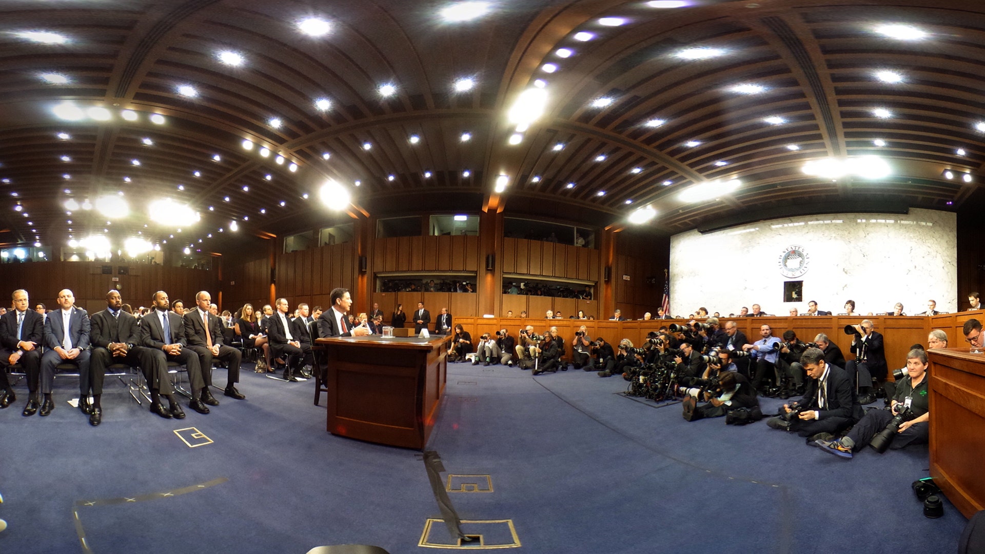 Former FBI Director James Comey testifies before a Senate Intelligence Committee hearing