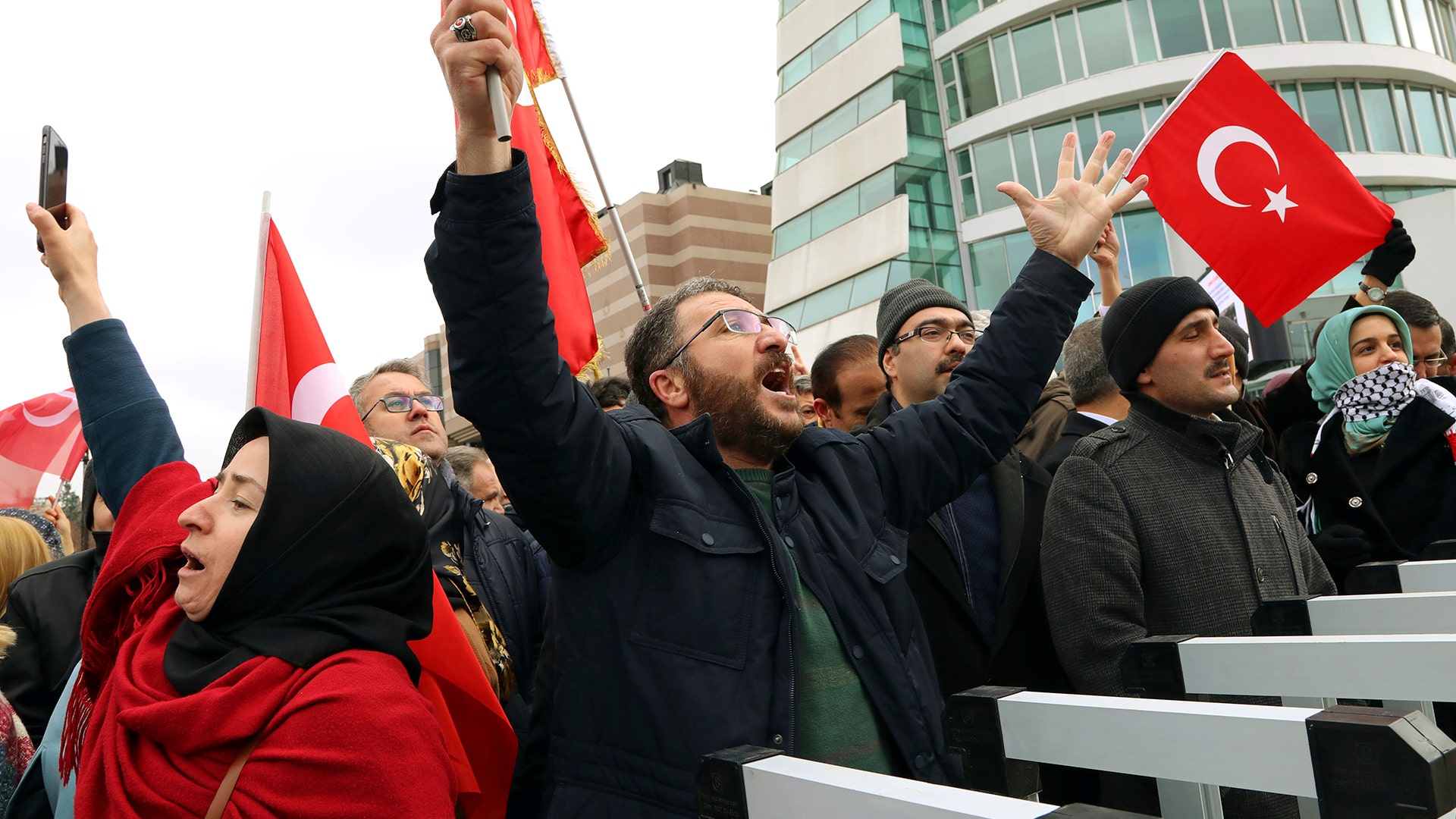 Protesters chant anti-U.S. slogans during a demonstration near the U.S. Embassy in Ankara, Turkey, December 7
