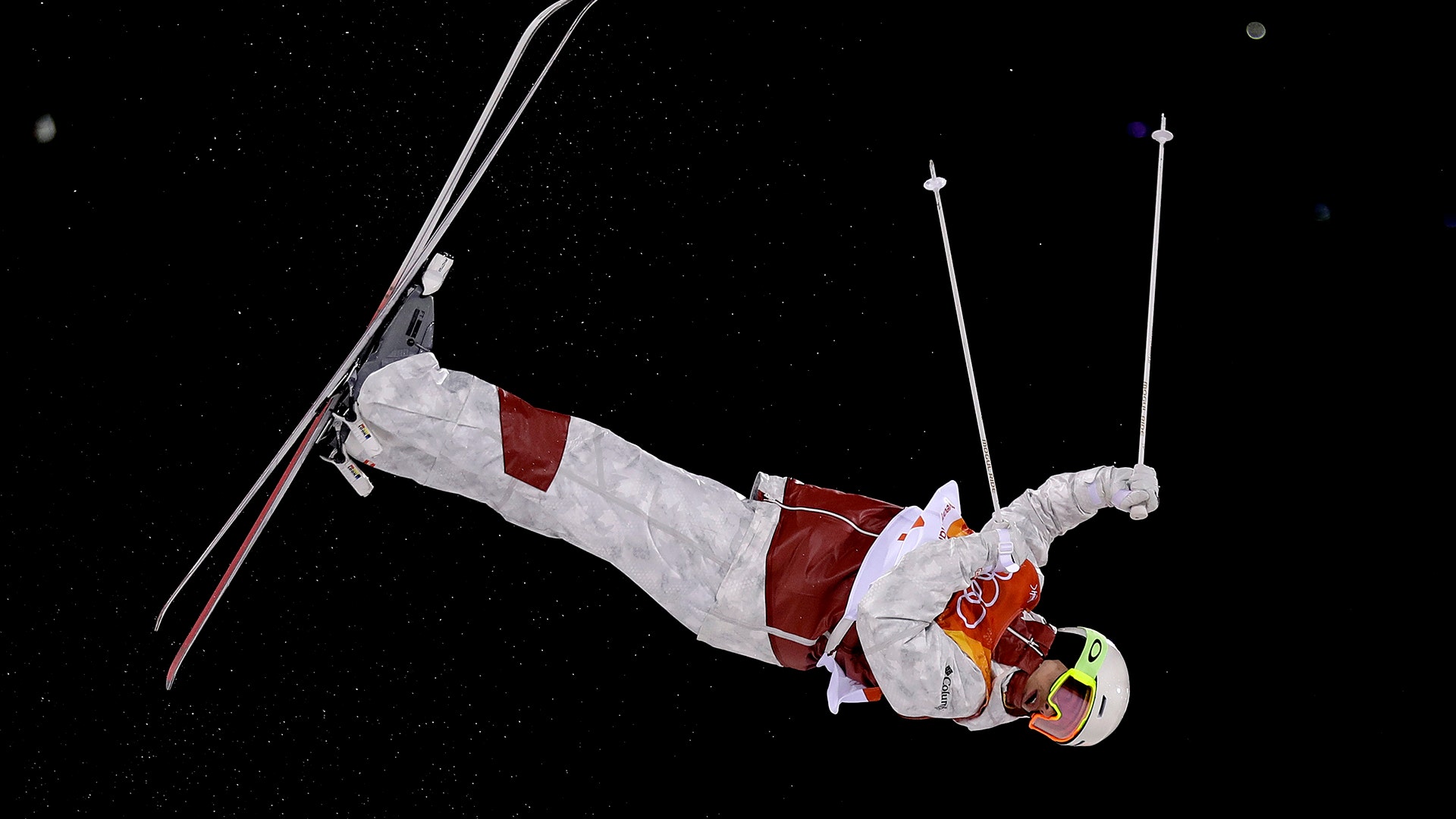 Mikael Kingsbury of Canada on his way to winning the gold medal in the men's moguls at the 2018 Winter Olympics