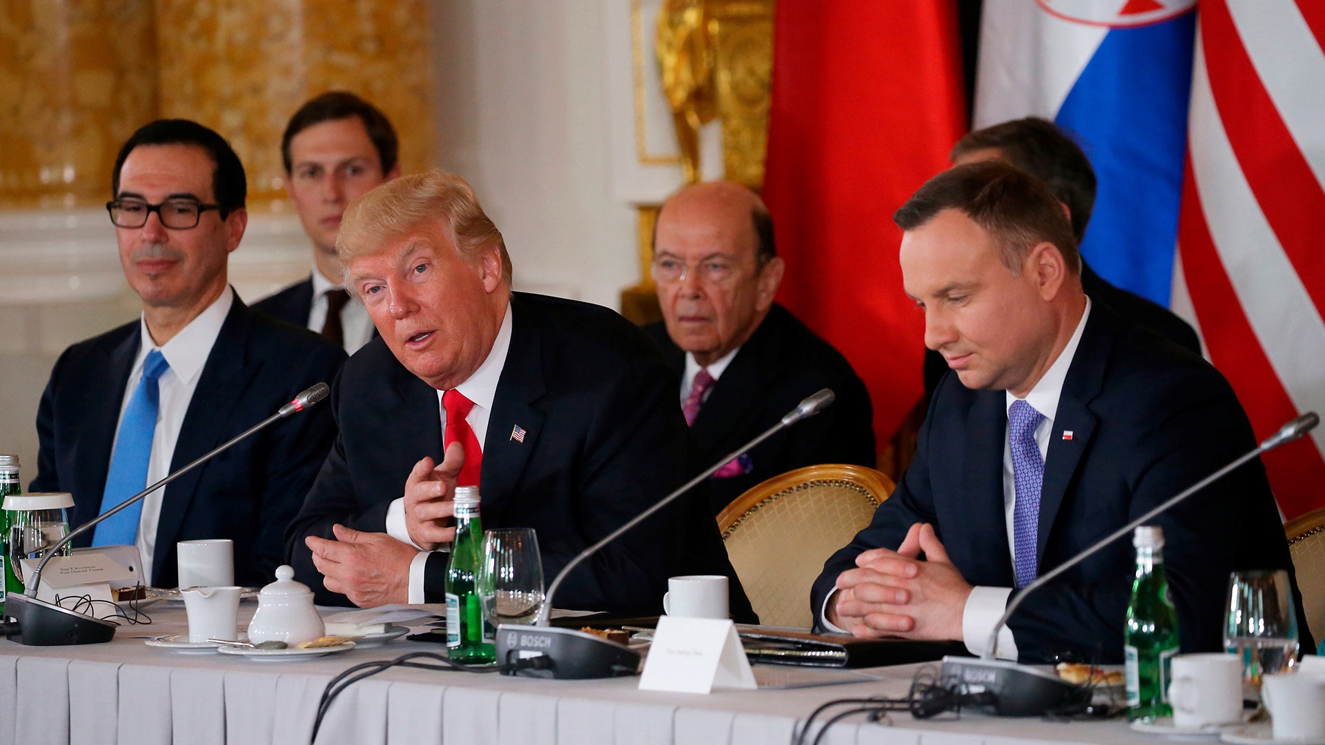 President Trump with Polish President Andrzej Duda, Treasury secretary, Steven Mnuchin, and Commerce Secretary, Wilbur Ross in Warsaw