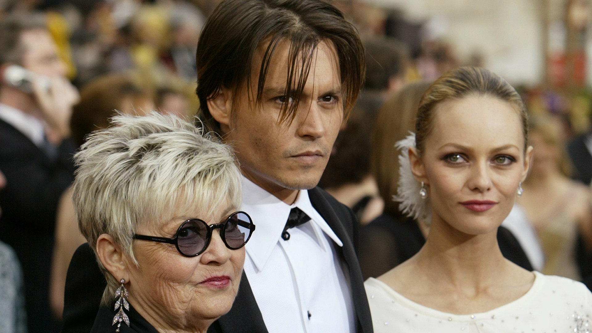 With girlfriend Vanessa Paradis and mother Betty Sue Palmer at the 76th annual Academy Awards in Hollywood, February 29, 2004