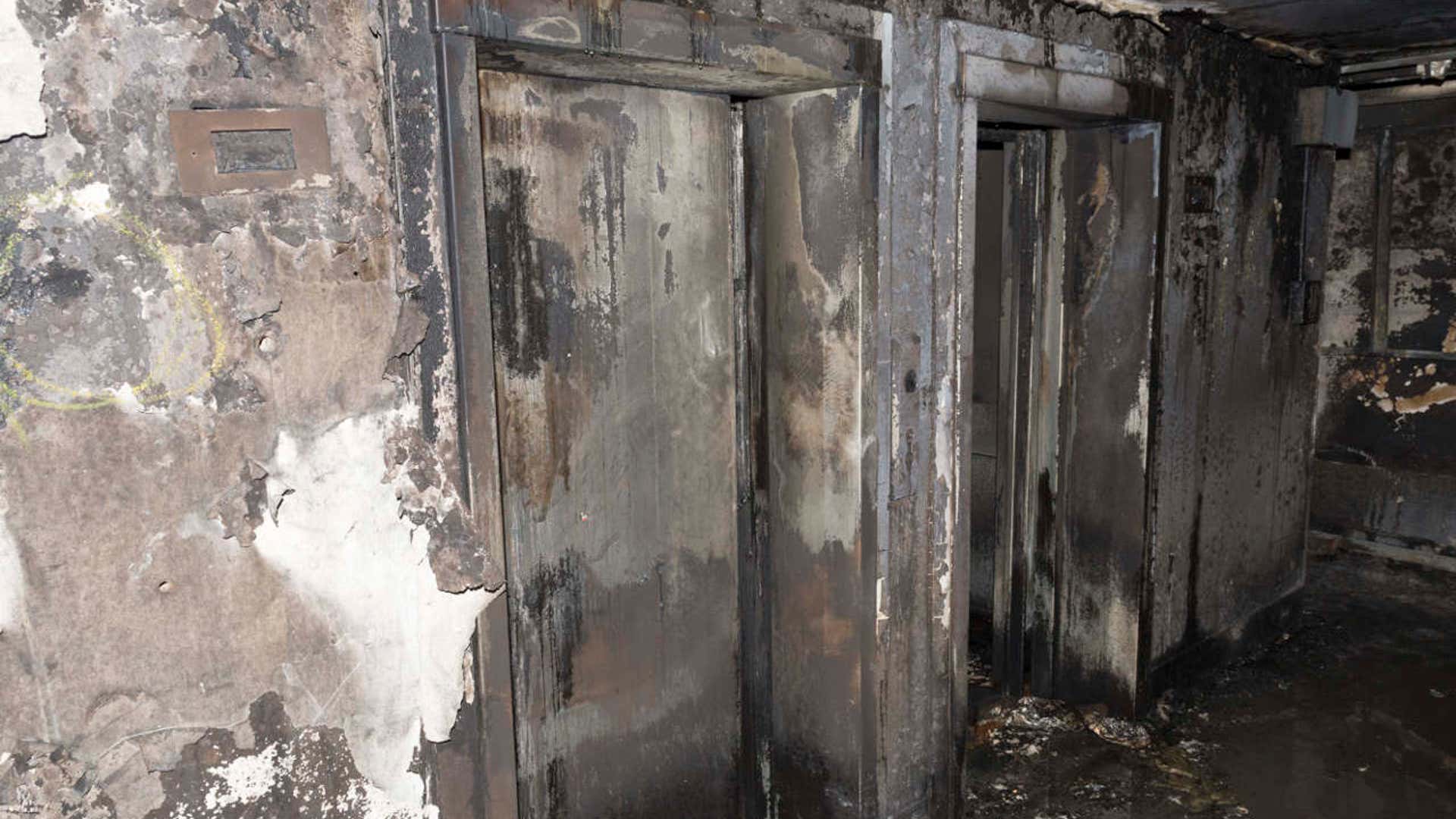 Photo released by the Metropolitan Police shows burnt elevators in the Grenfell Tower fire in London