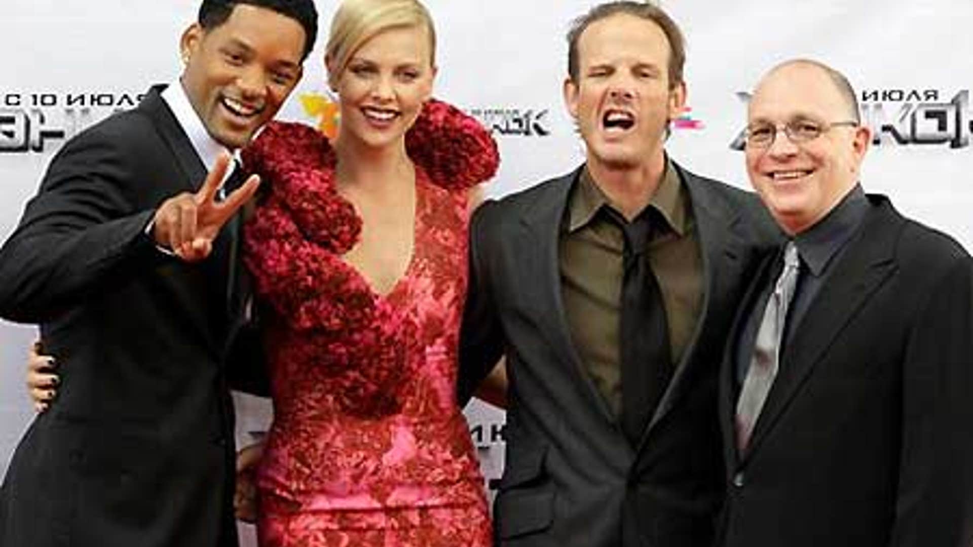 Will Smith, Charlize Theron, director Peter Berg and producer Akiva Goldsman