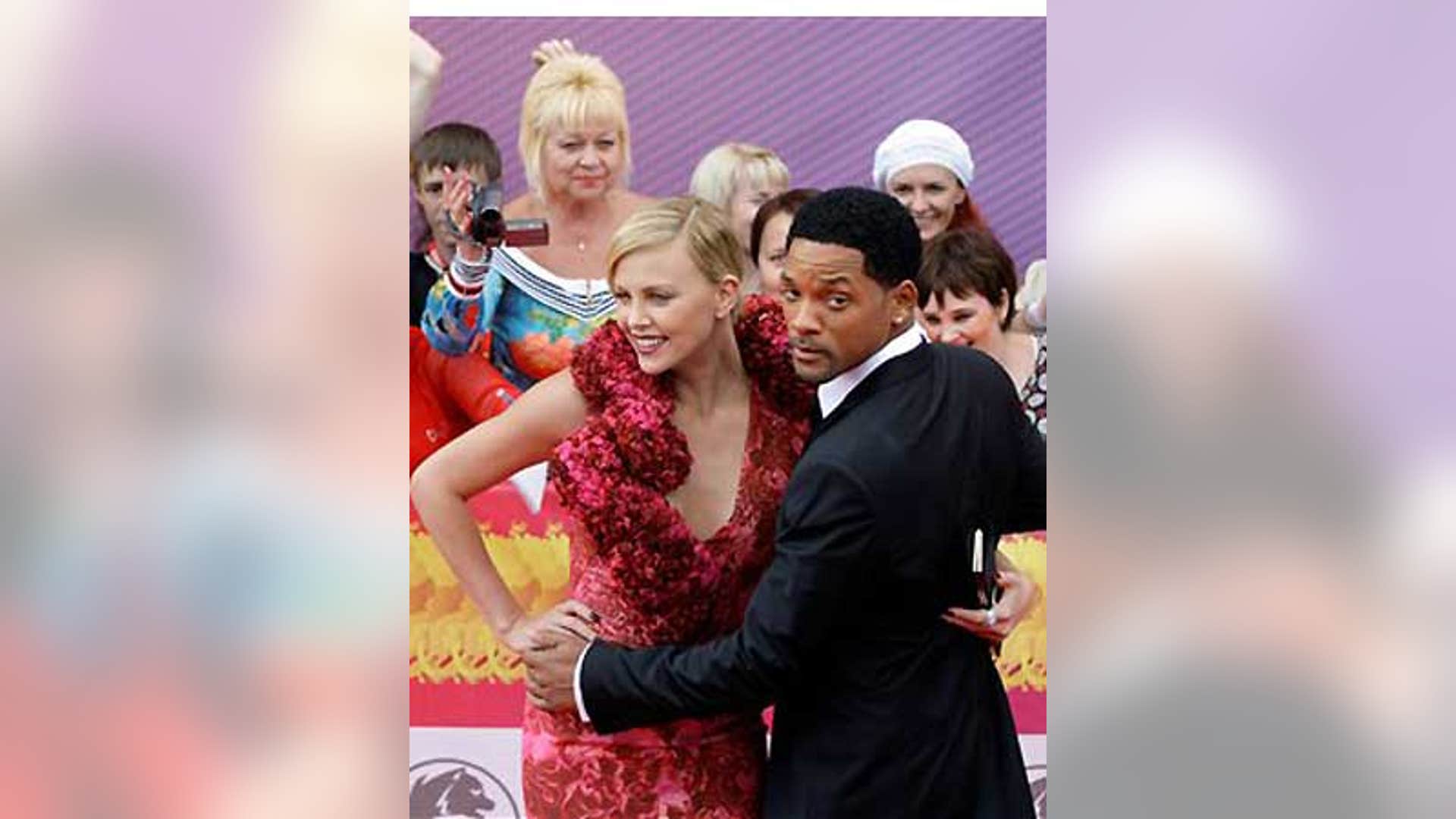 Charlize Theron and Will Smith