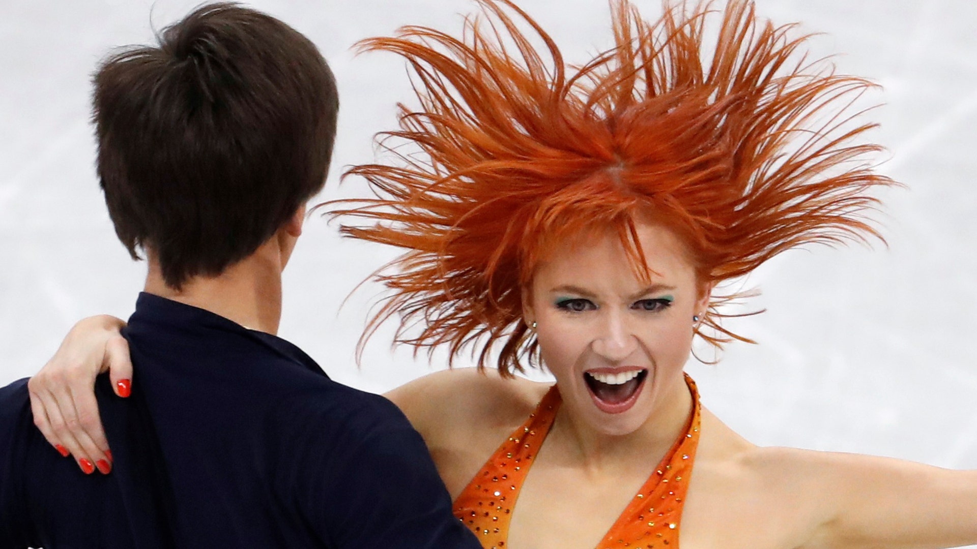 Tiffani Zagorski and Jonathan Gurreiro, Olympic athletes from Russia during their ice dance short program at the Winter Olympics
