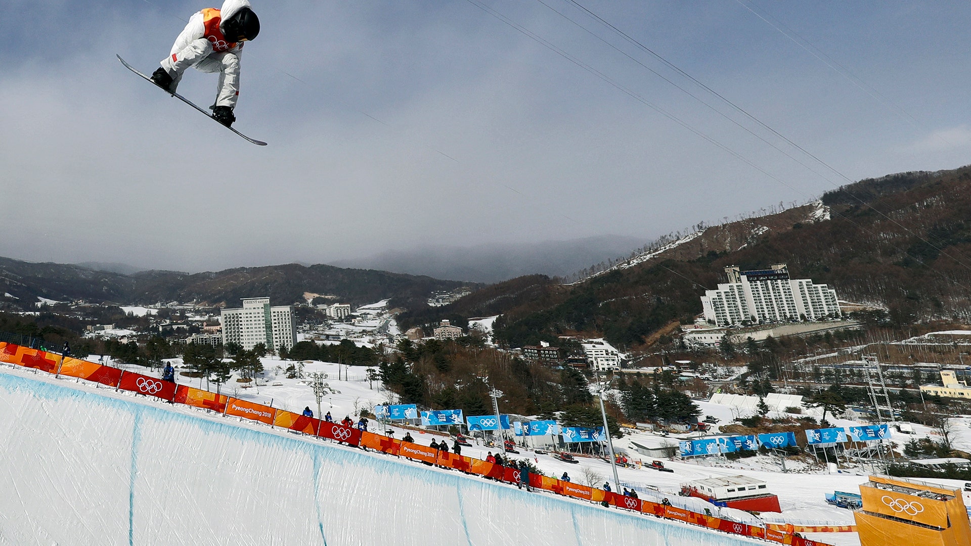 Shaun White, of the United States, jumps during the men's halfpipe competition at the 2018 Winter Olympics in Pyeongchang
