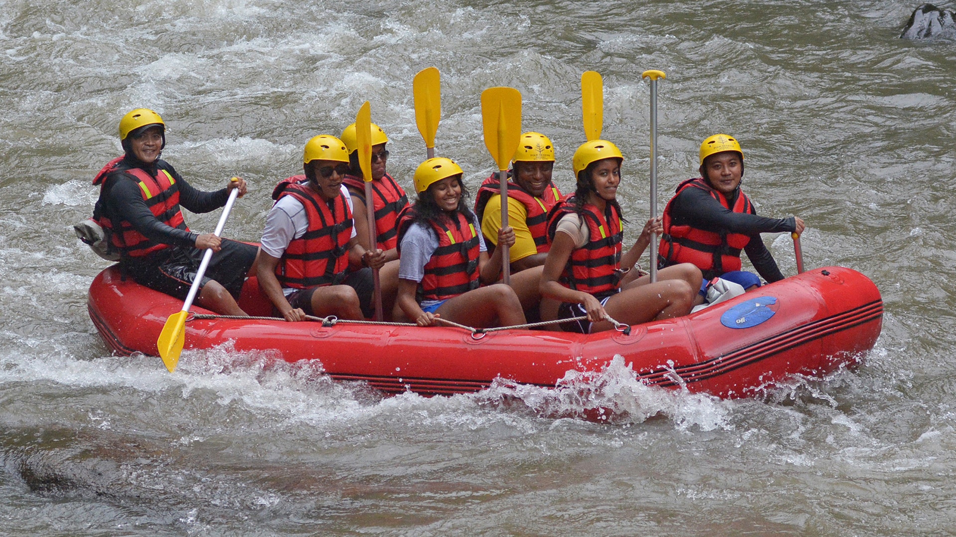 Former President Barack Obama rafts with his wife Michelle and daughters Sasha and Malia in Bali, Indonesia June 26, 2017