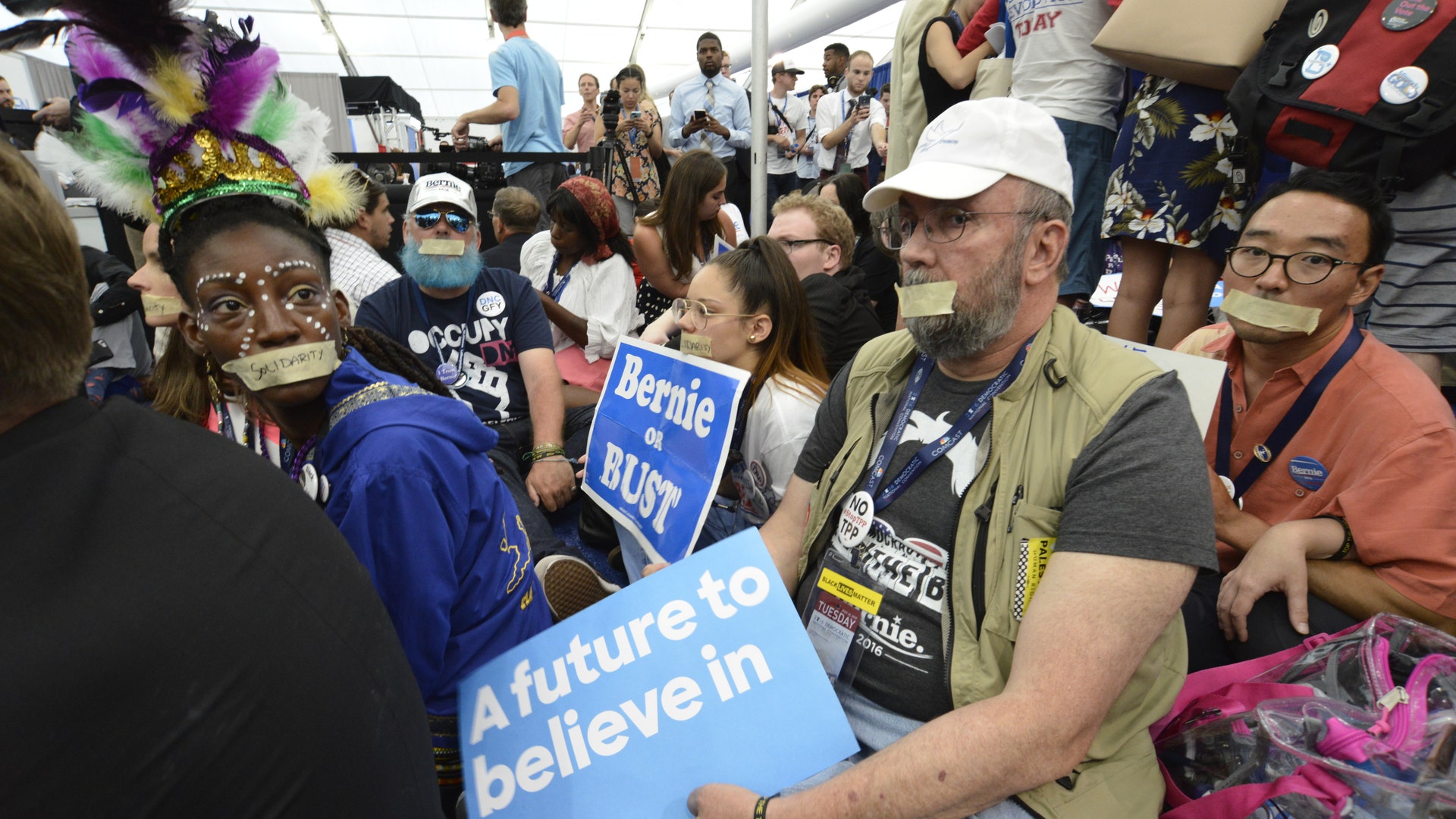 Protesters occupy the media tent after the nomination of Hillary Clinton.