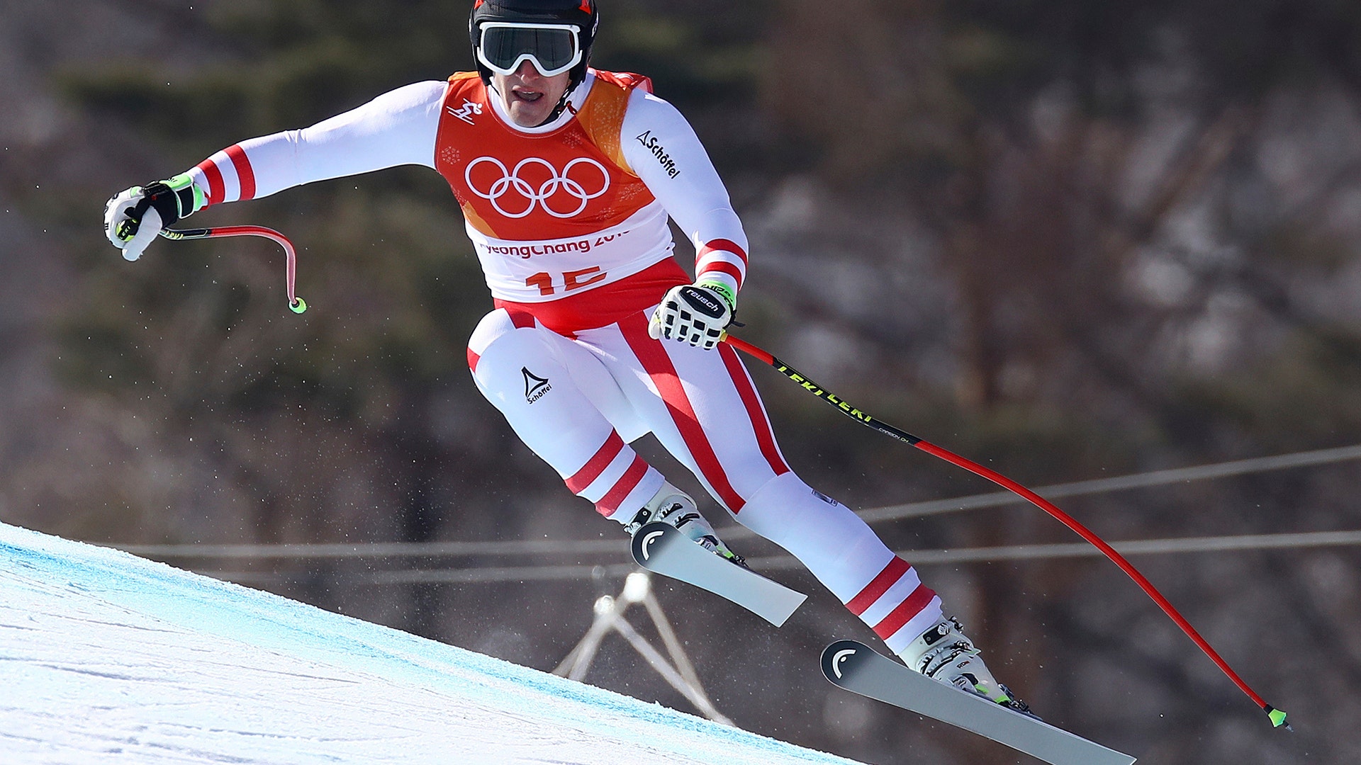 Austria's Matthias Mayer competes on his way to winning the gold medal in the men's super-G at the 2018 Winter Olympics 
