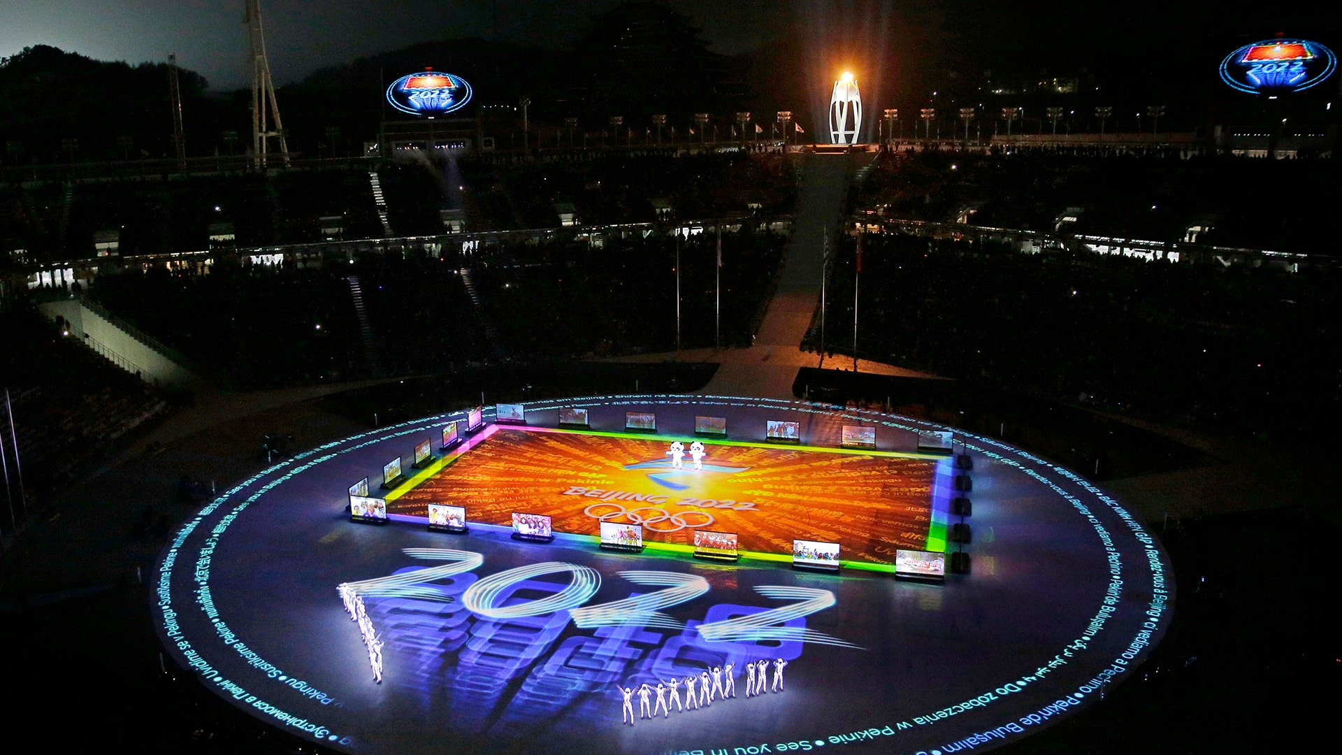 Performers dressed as pandas take the stage as Beijing is celebrated as the next host city for the 2022 Winter Olympics