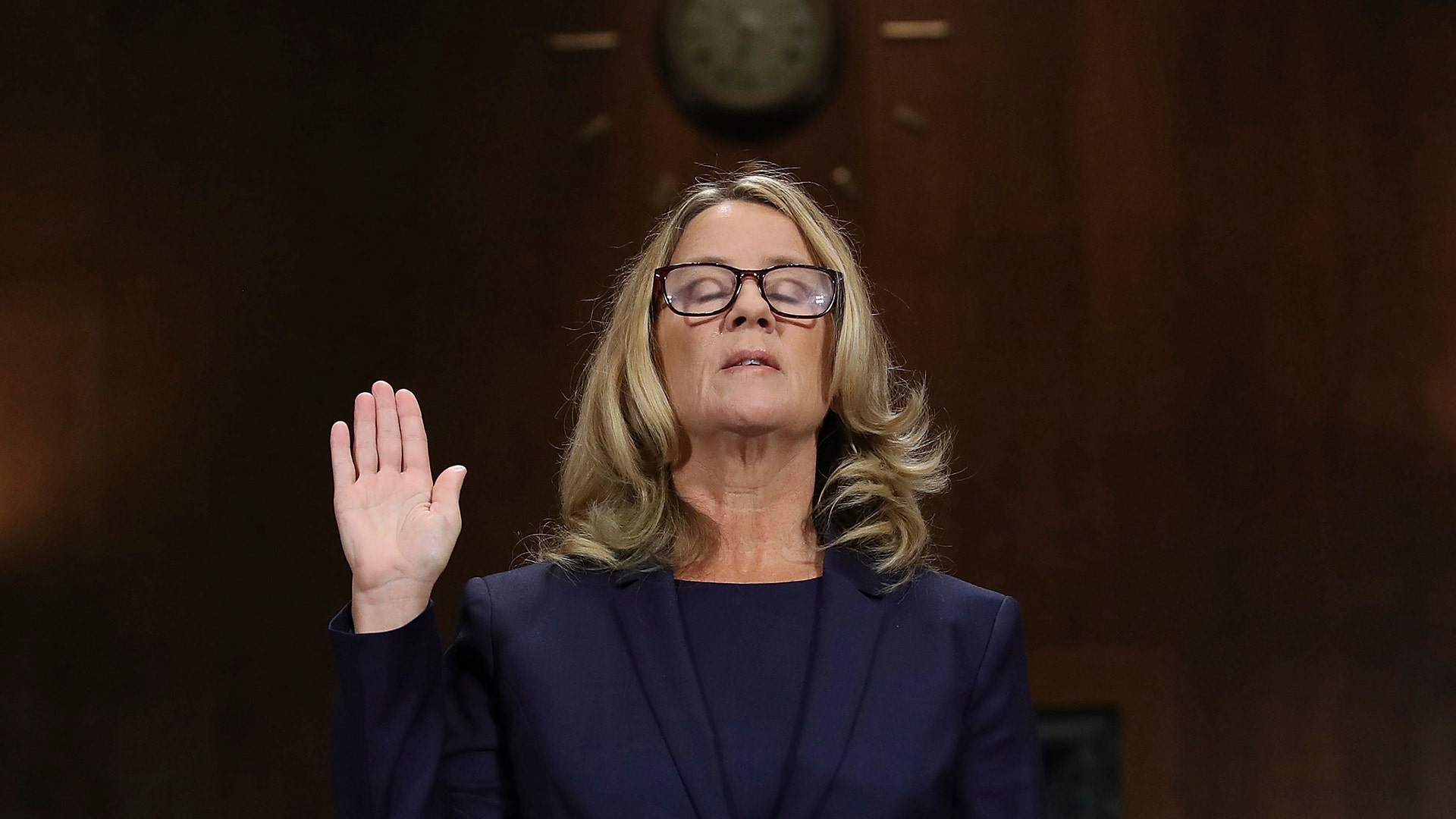 Christine Blasey Ford is sworn in before the Senate Judiciary Committee, in Washington, September 27, 2018