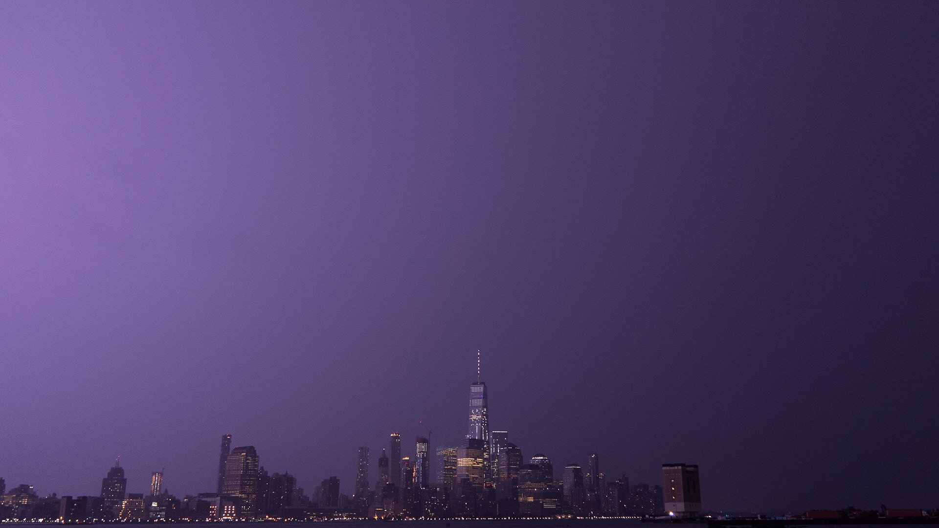 Lightning illuminates the skies over lower Manhattan in New York City Tuesday night