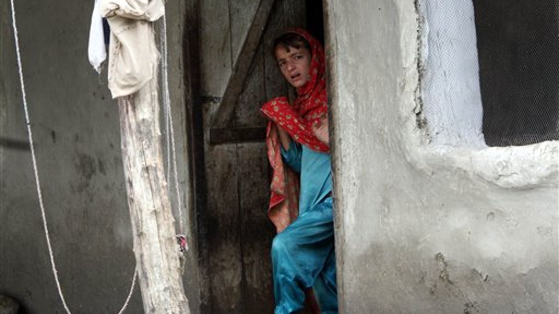 Girl in Flooded House