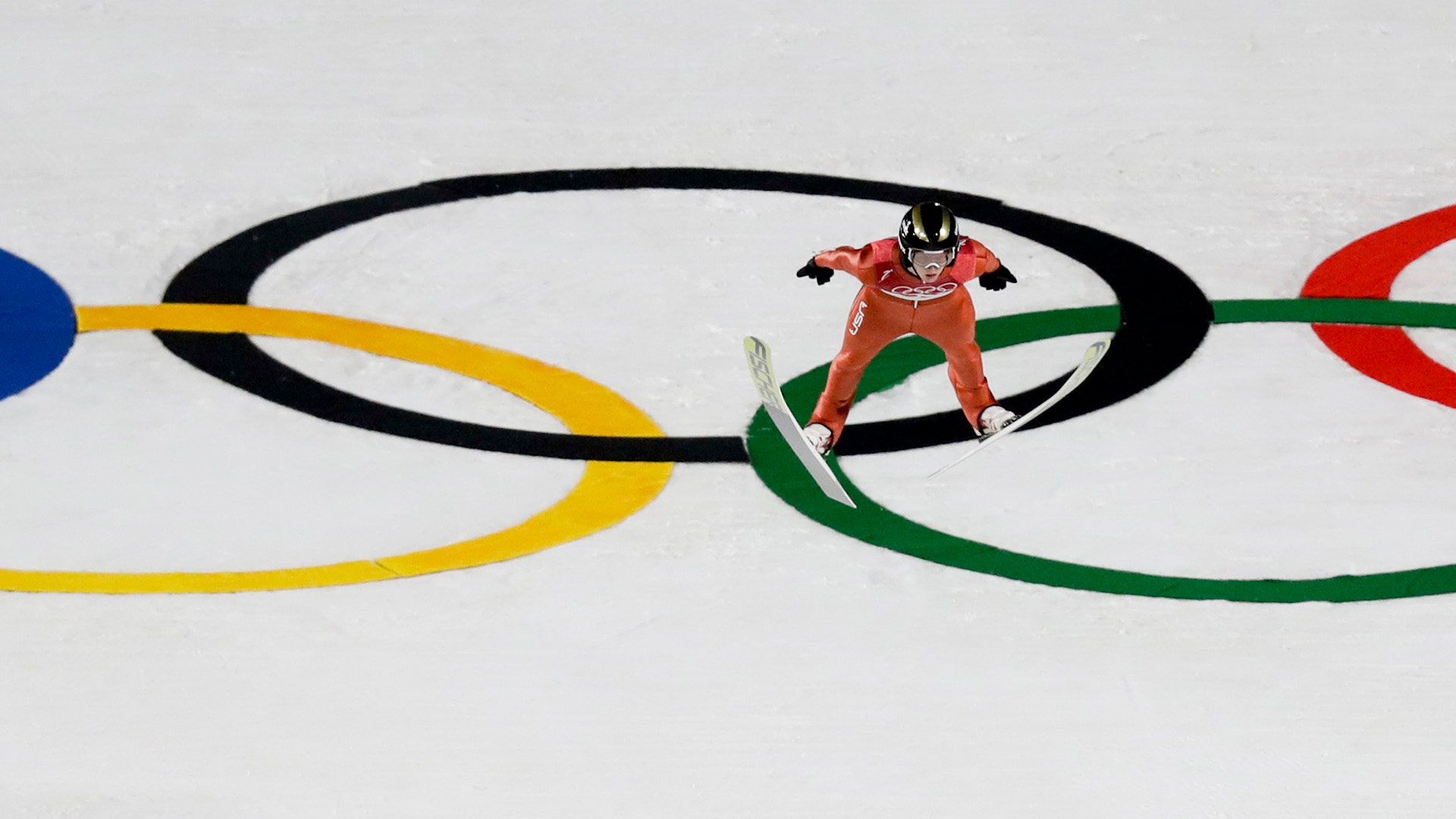 Kevin Bickner, of the United States, soars through the air during men's large hill Individual ski jumping