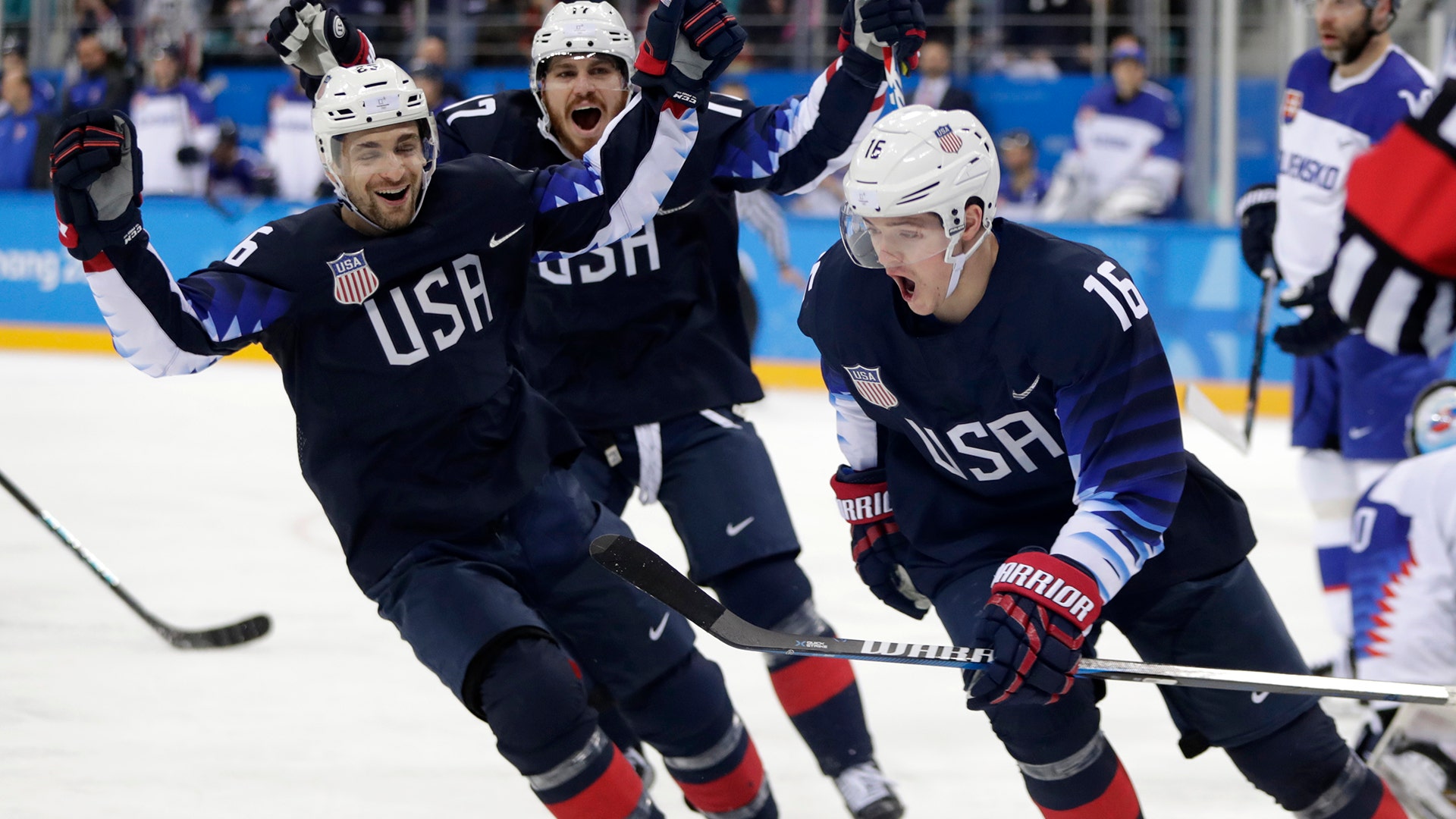 Ryan Donato (16), of the United States, celebrates after scoring a goal against Slovakia in a men's hockey game at the 2018 Winter Olympics