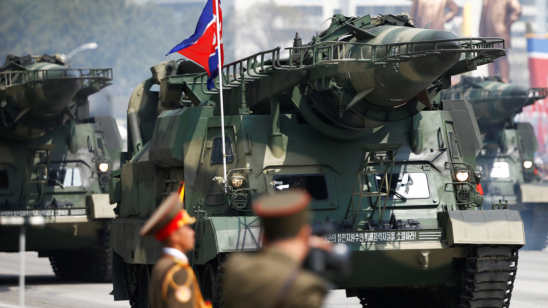 Missiles are driven past the stand with North Korean leader Kim Jong Un during a military parade in Pyongyang, April 15, 2017