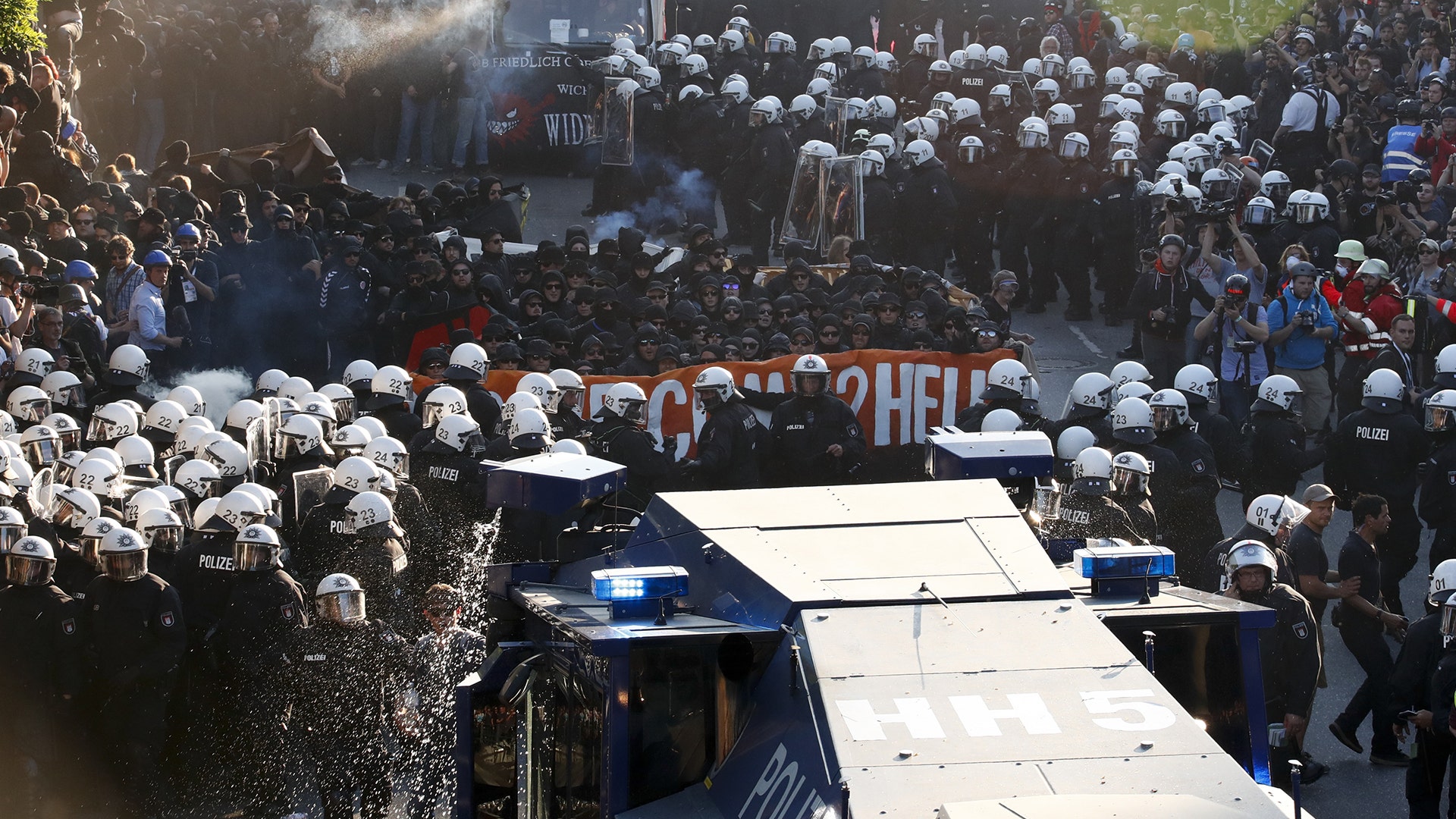 German riot police confront protesters during the demonstrations at the G-20 summit in Hamburg, Germany