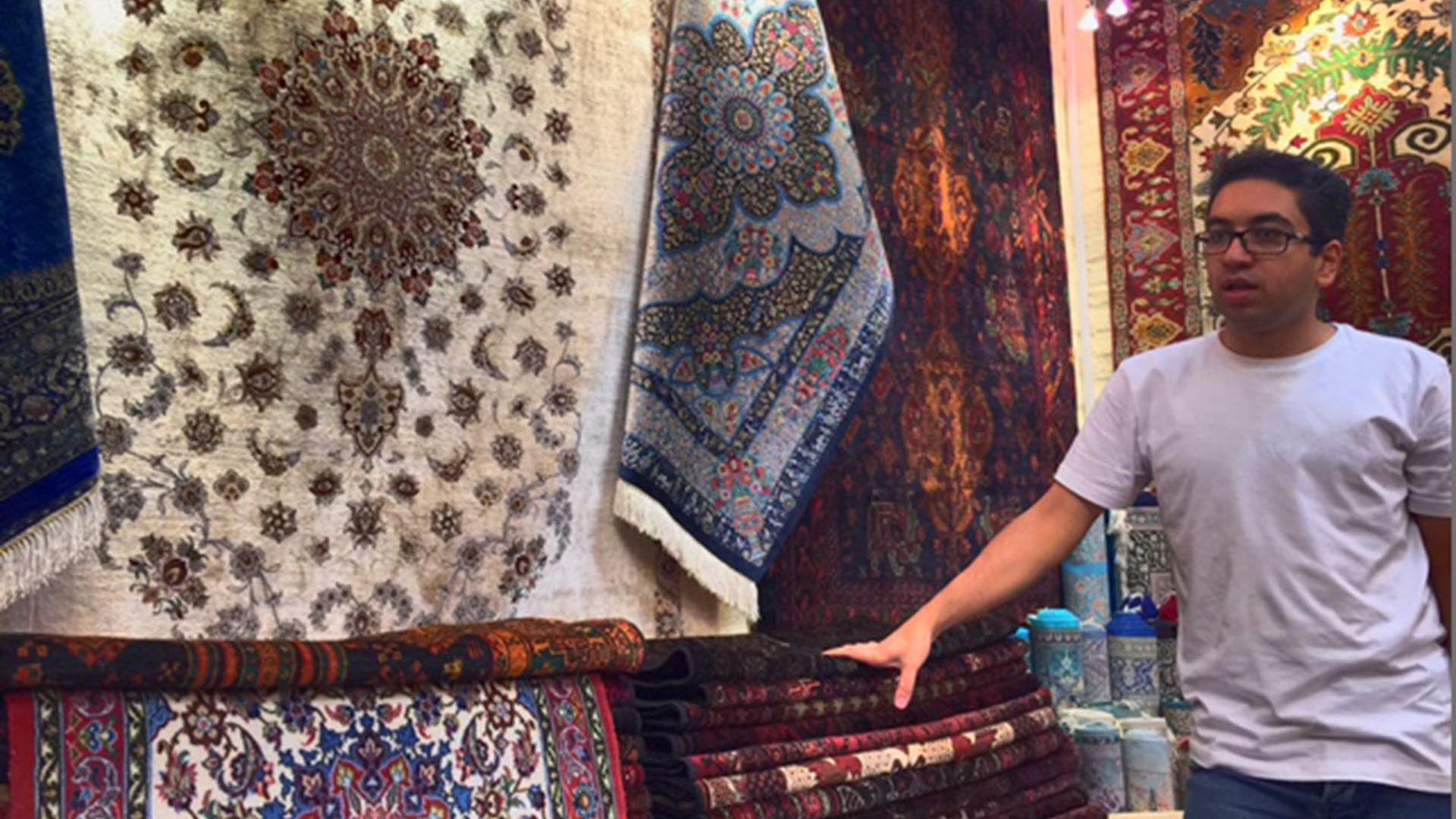 Carpet sellers offer tea and extensive educational lessons in the types of fabrics and history of each rug