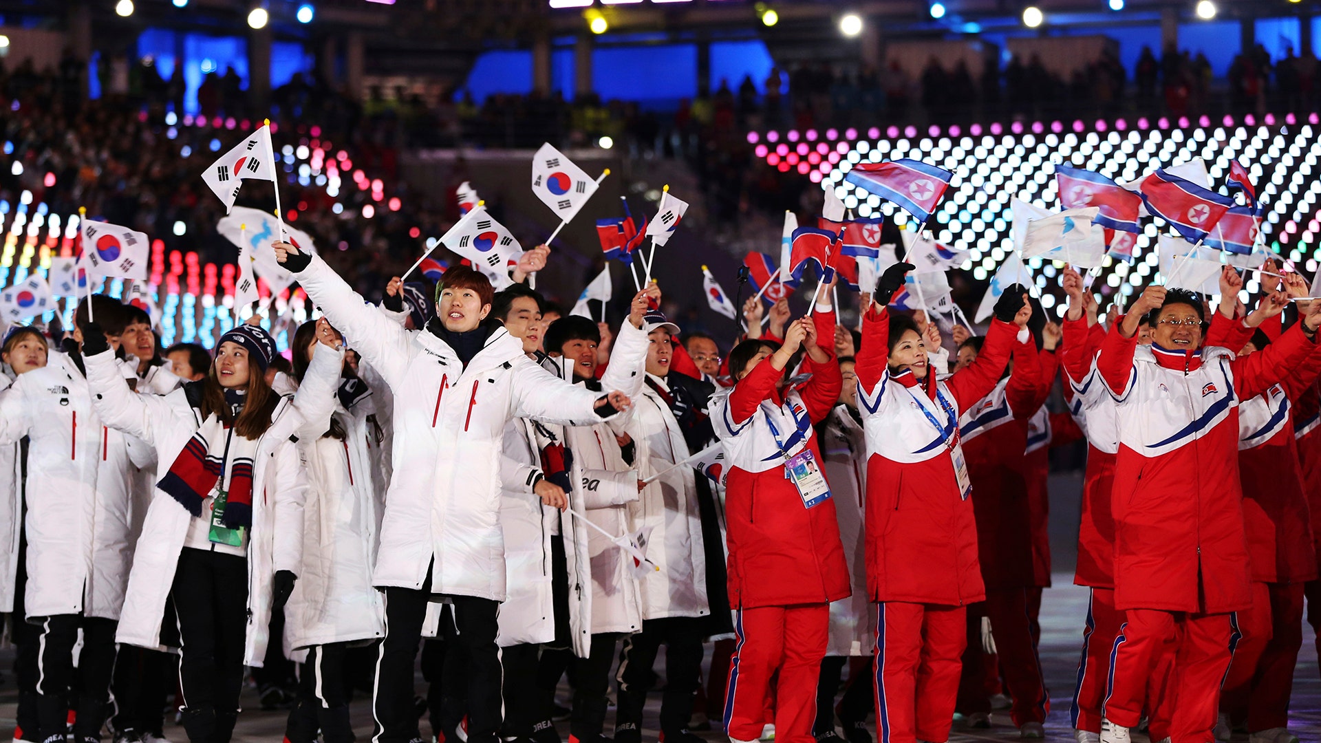 Спортсмены южной кореи. Сборная Северной Кореи Олимпиаде в Токио. Спортсмены Северной Кореи. КНДР на зимних Олимпийских играх 2018. Северная Корея на зимних Олимпийских играх.