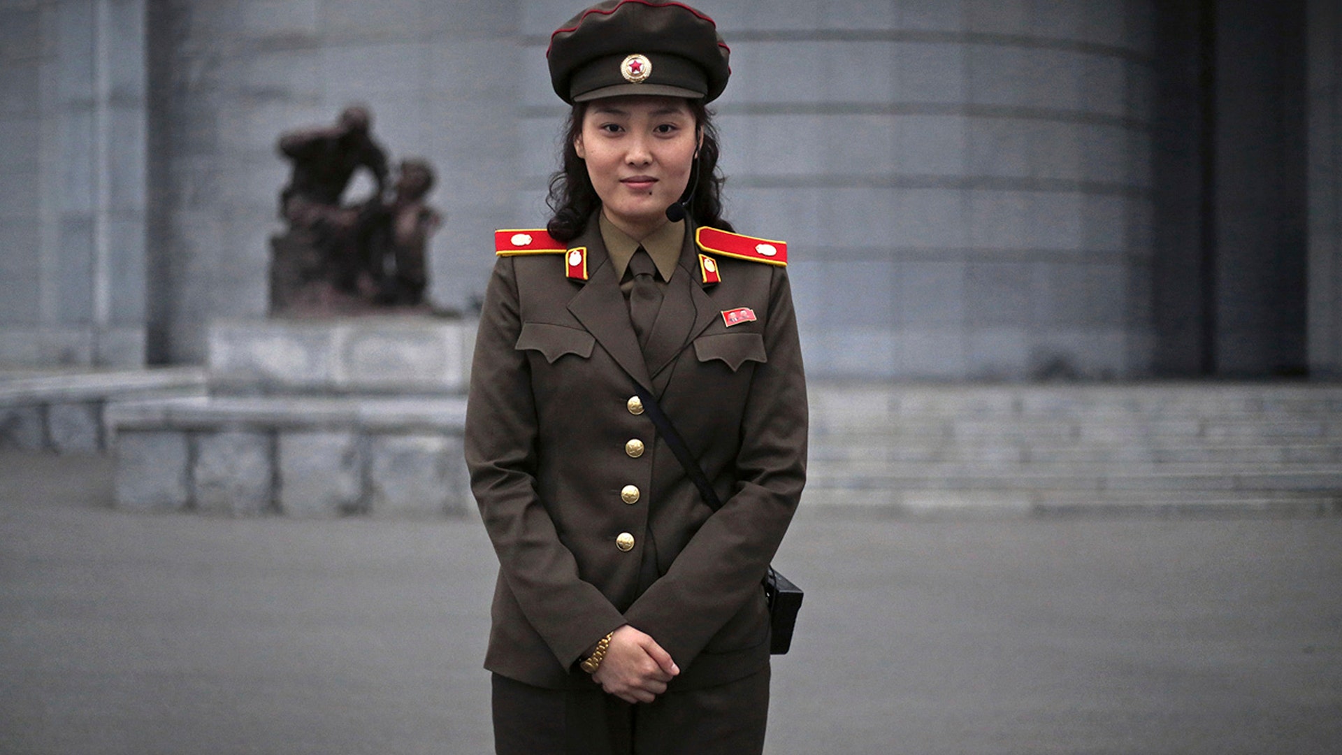 Capt. Ri Ok Gyong, 24, poses for a portrait at the Fatherland Liberation Museum in Pyongyang, North Korea, April 9, 2017