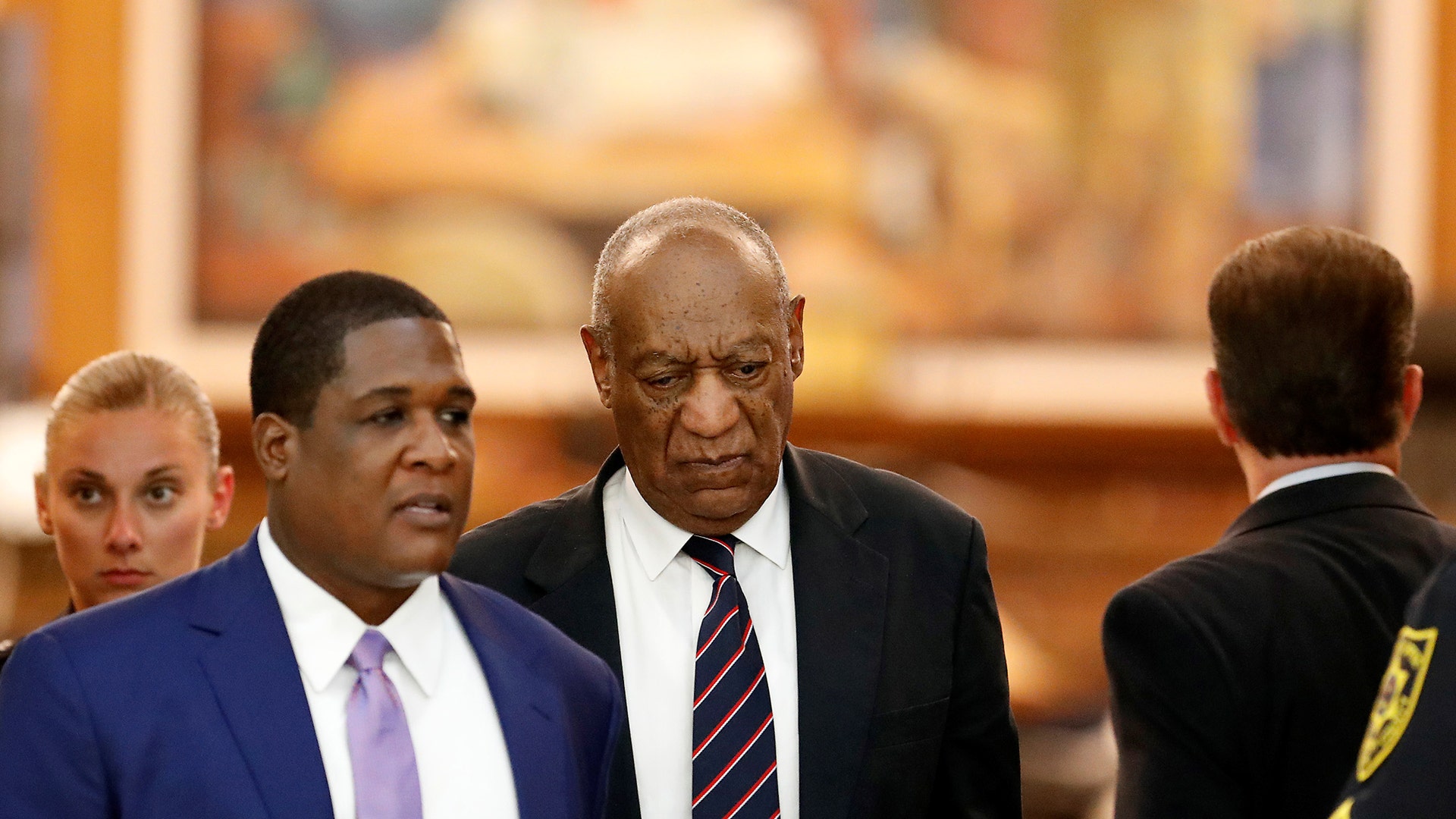 Bill Cosby leaves the courtroom during his sexual assault trial at the Montgomery County Courthouse, June 12, 2017. 