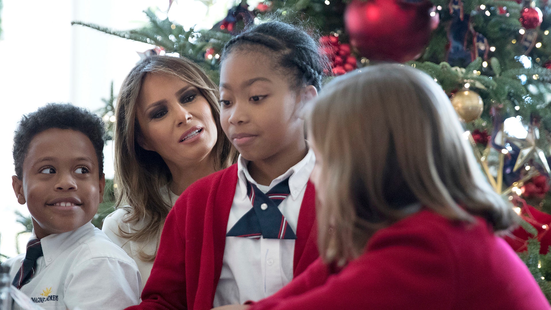 First lady Melania Trump visits with children in the East Wing on Monday.
