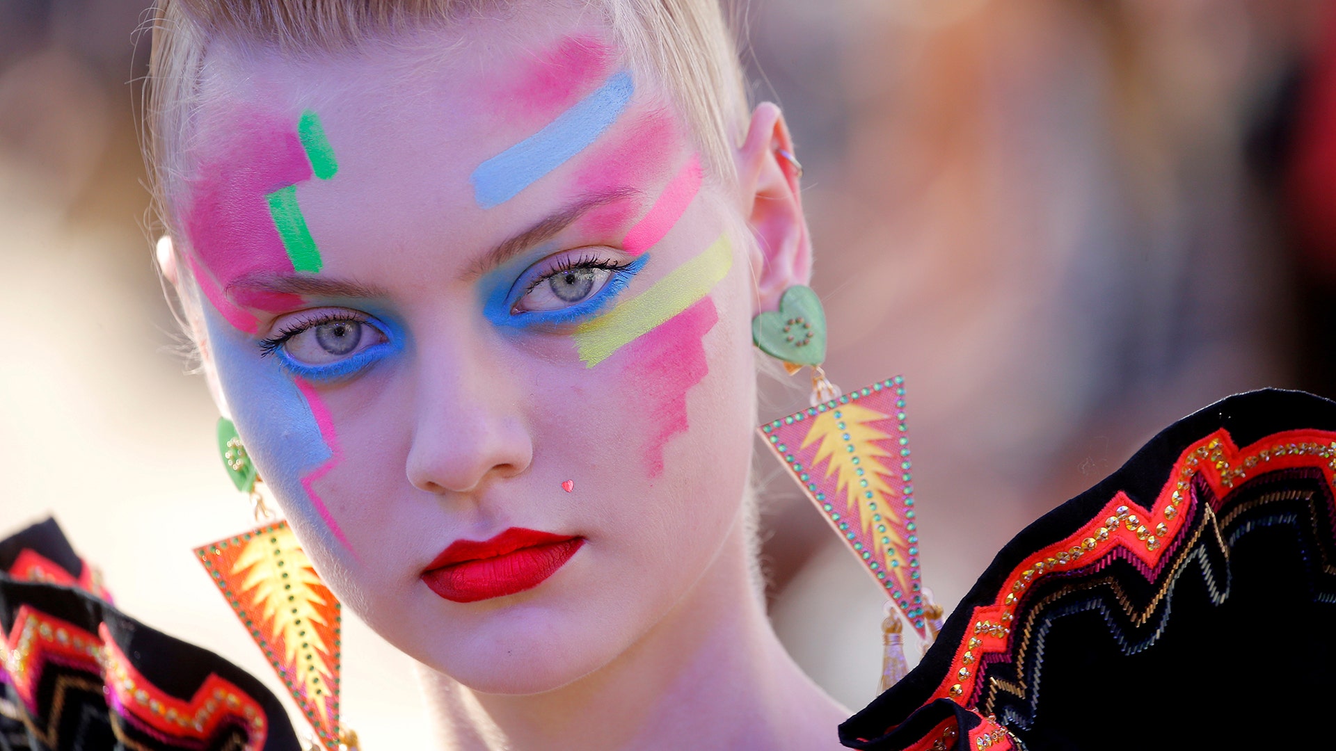 A model presents a creation by Indian designer Manish Arora during Paris Fashion Week September 27, 2018