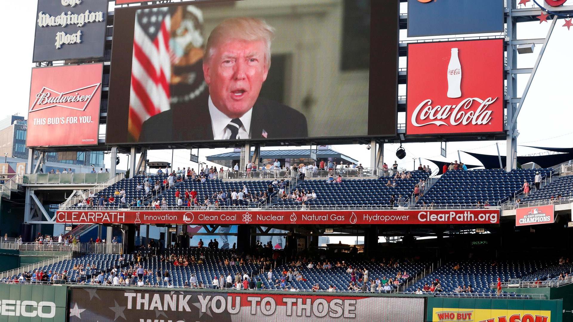 A message from President Donald Trump is shown on the video board before the Congressional baseball game