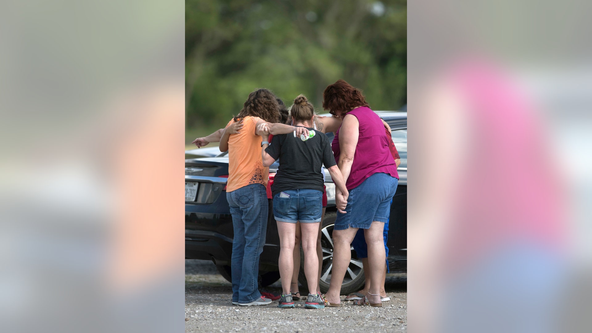 Parents of Santa Fe High School students join in prayer following a shooting at Santa Fe High School, in Santa Fe, Texas, May 18, 2018