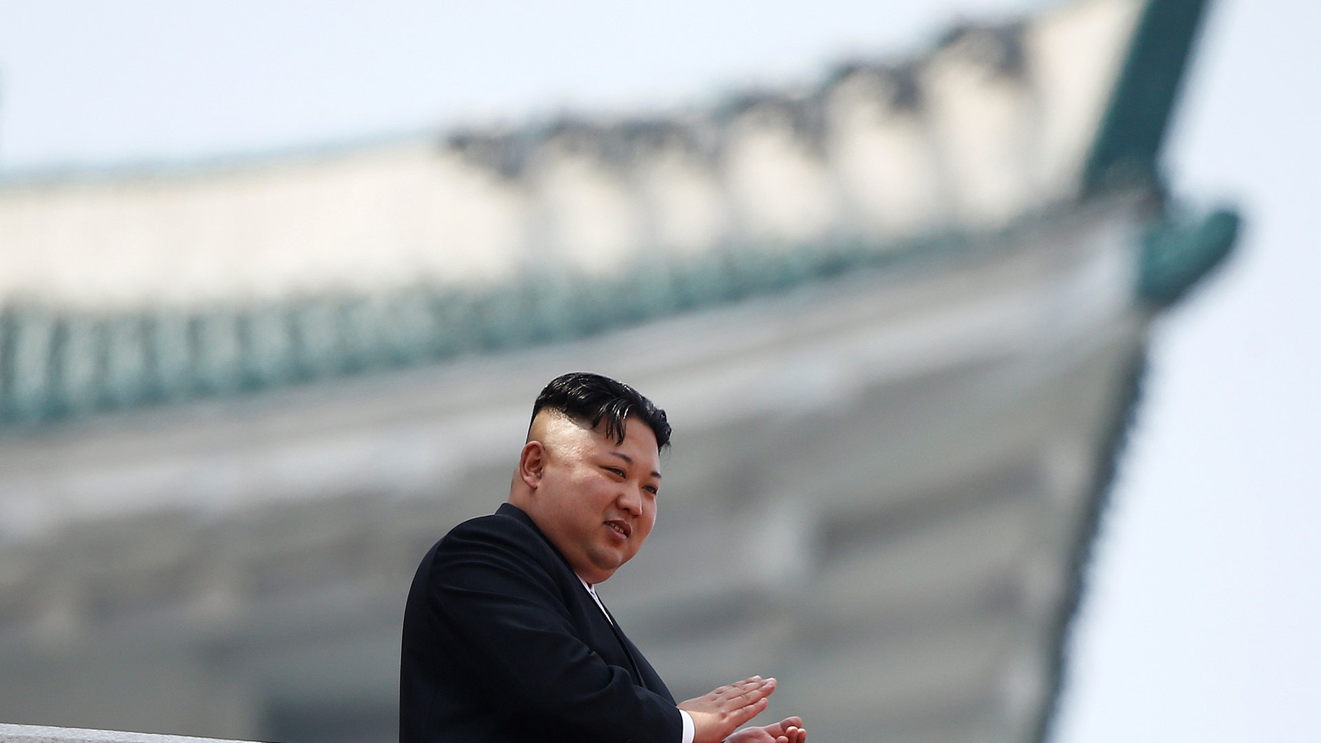 North Korean leader Kim Jong Un applauds during a military parade in Pyongyang April 15, 2017
