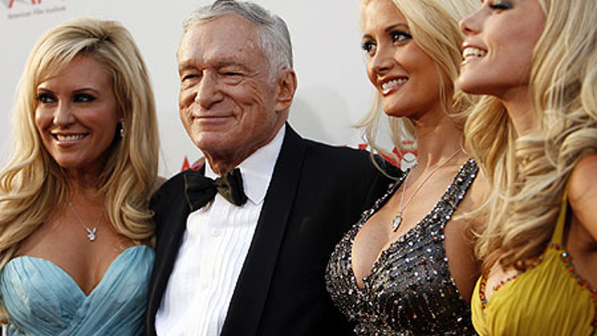 Hugh Jefner and the girls next door