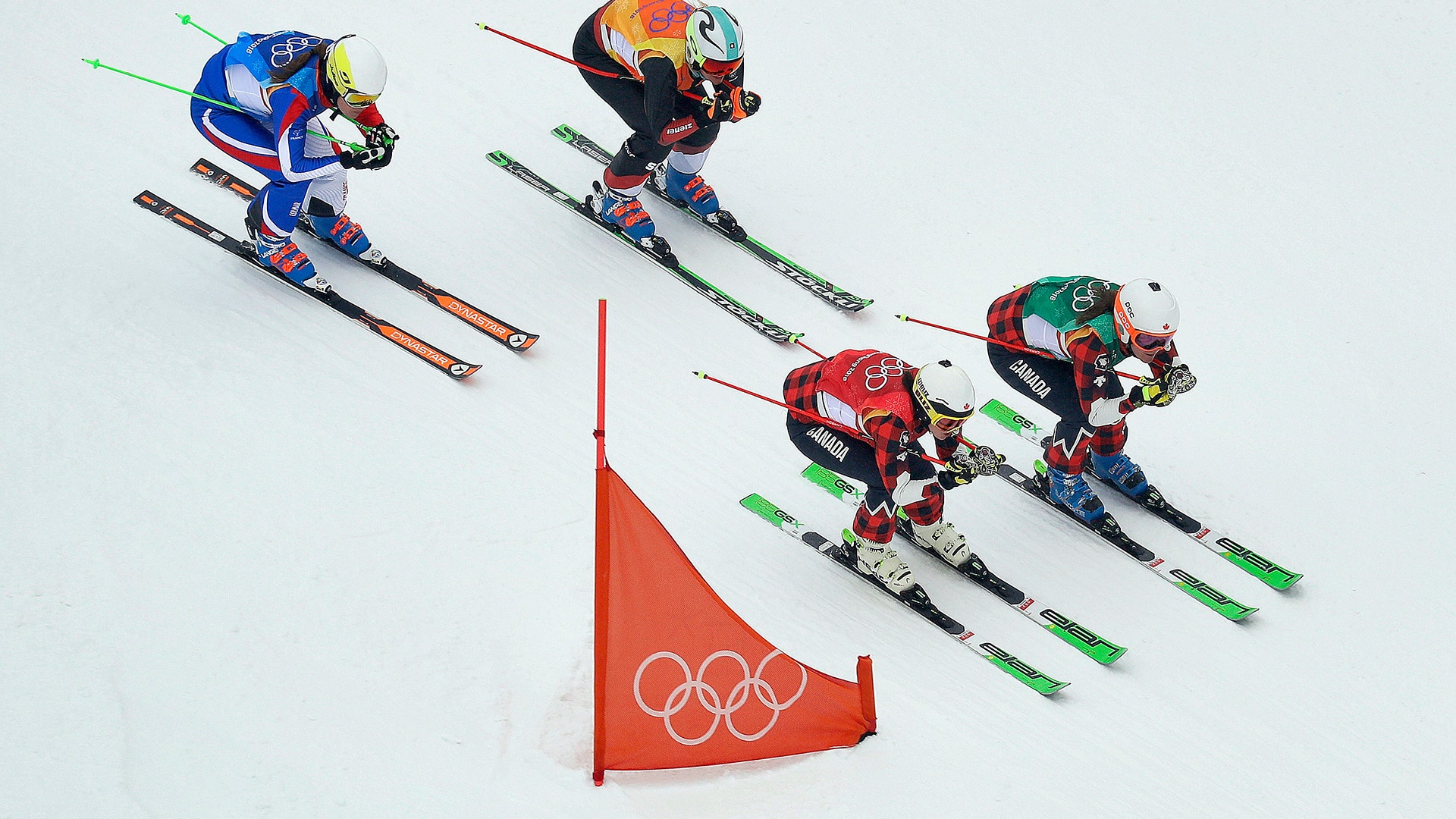 Competitors in the women's ski cross competition at the 2018 Winter Olympics in Pyeongchang 