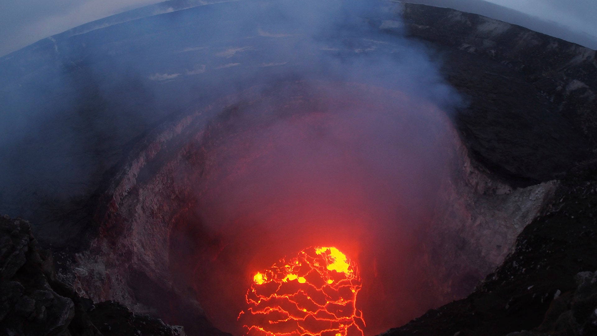 The lava lake glows at the summit of Kilauea near Pahoa, Hawaii, May 6, 2018