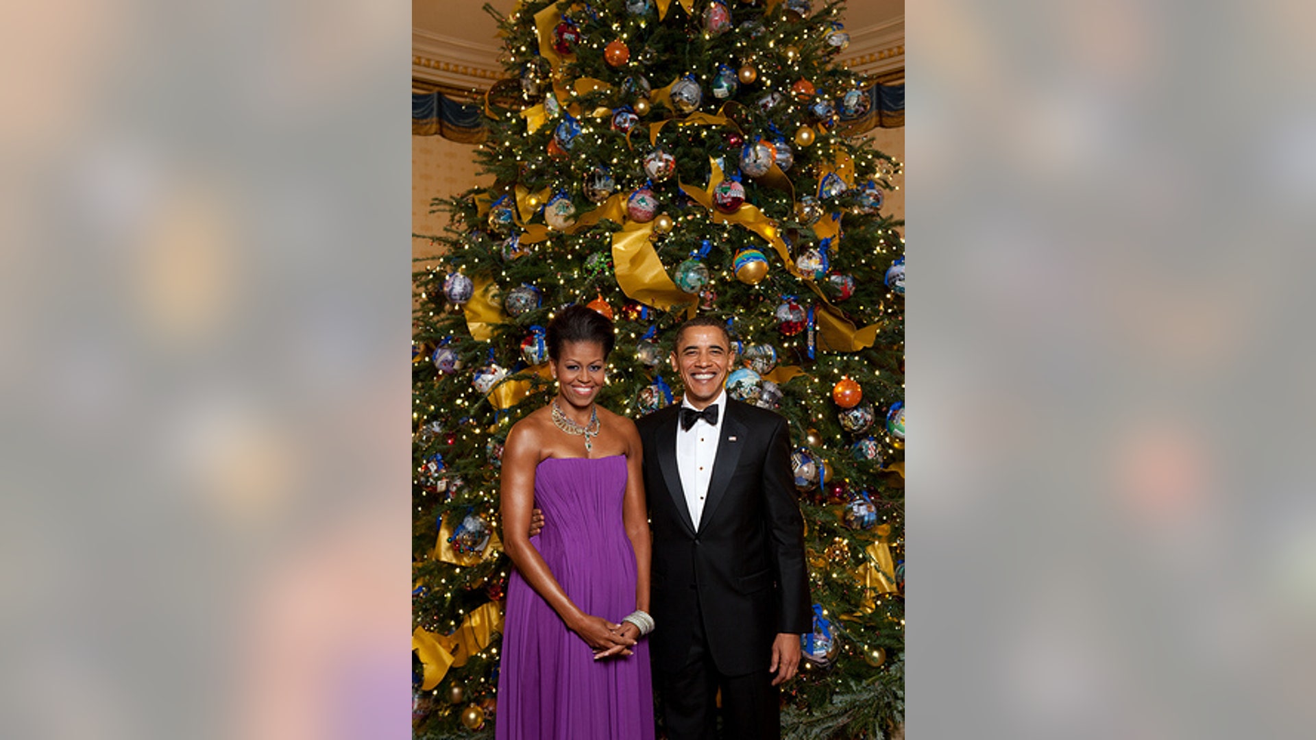 Obamas in Front of Christmas Tree